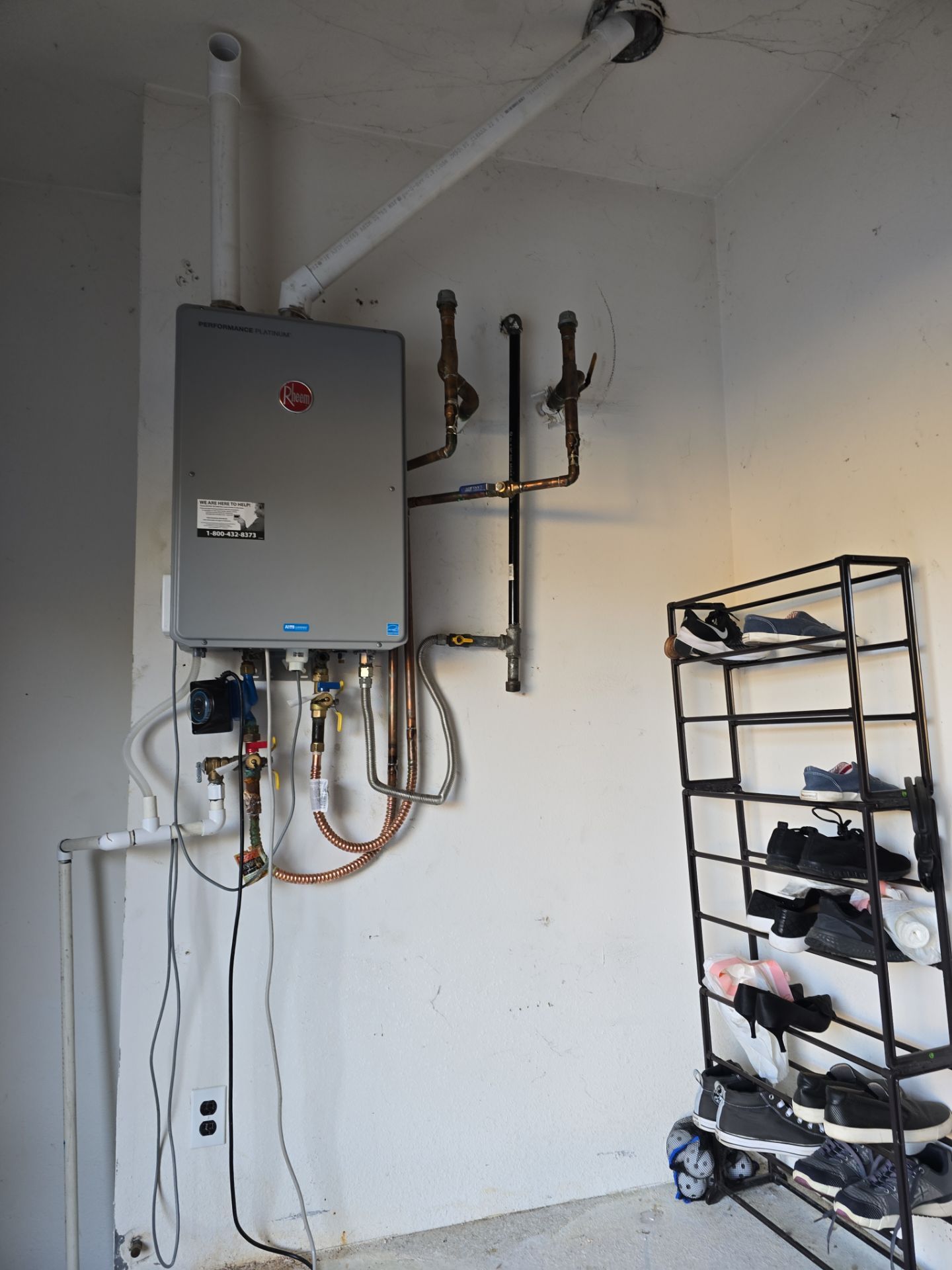 Installing a New Tankless Water Heater by Us Plumbing 