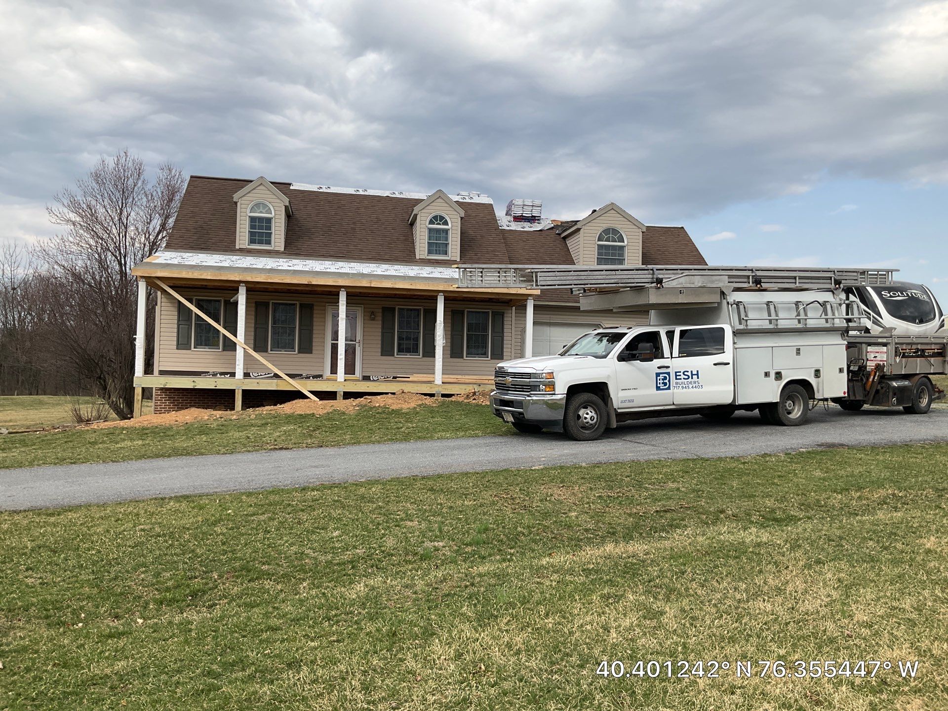 Custom Porch Roof Addition and Siding Renovation in Myerstown, PA by Esh Builders