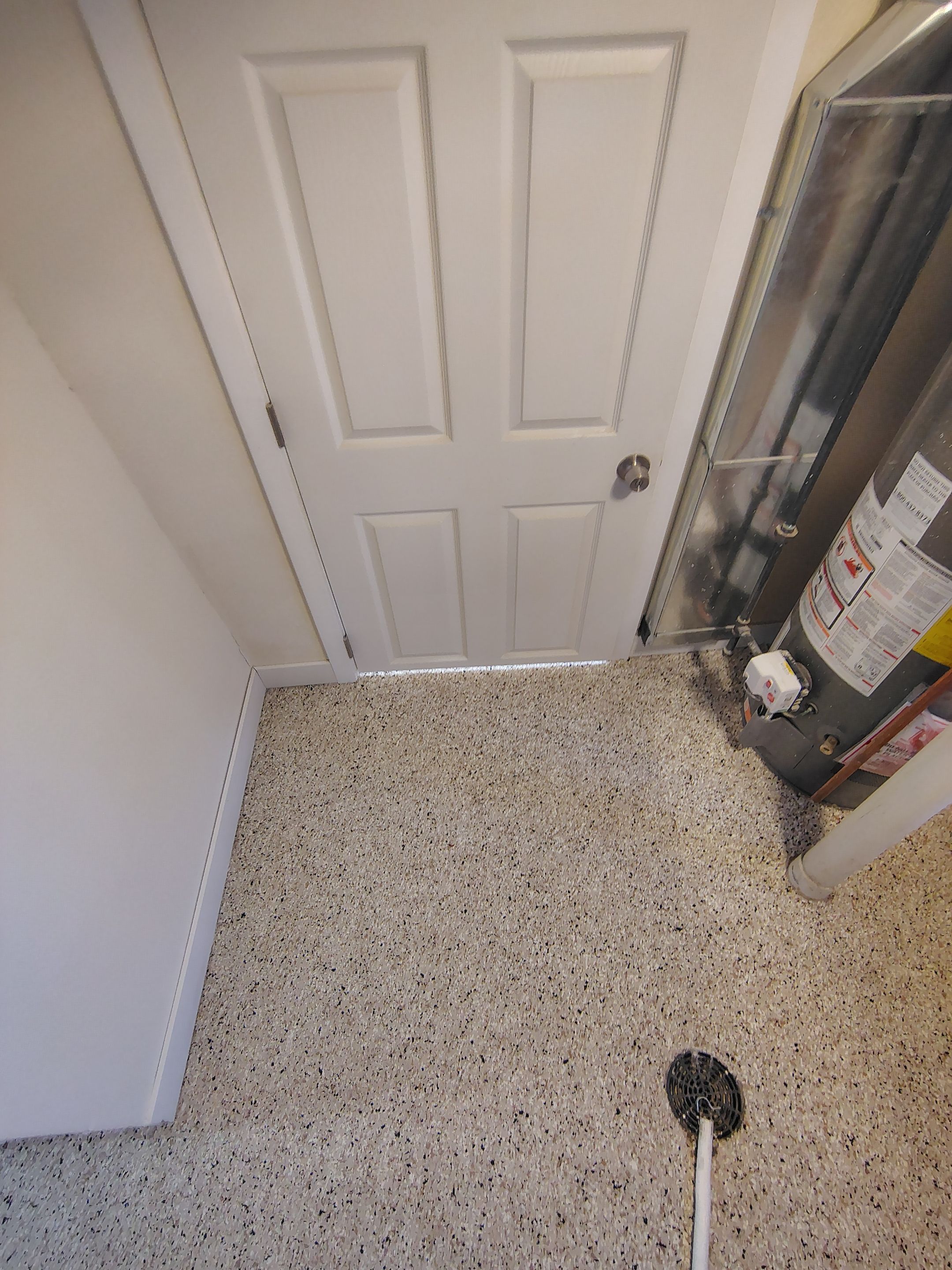 Comprehensive Basement Concrete Floor Coating and Crack Repair in Sioux Falls by Select Painting, Coatings & Garage Cabinets