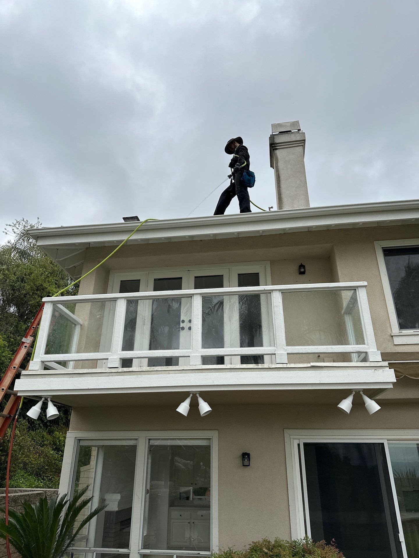 Gutter flush and window cleaning by Property Cleaning Experts, LLC