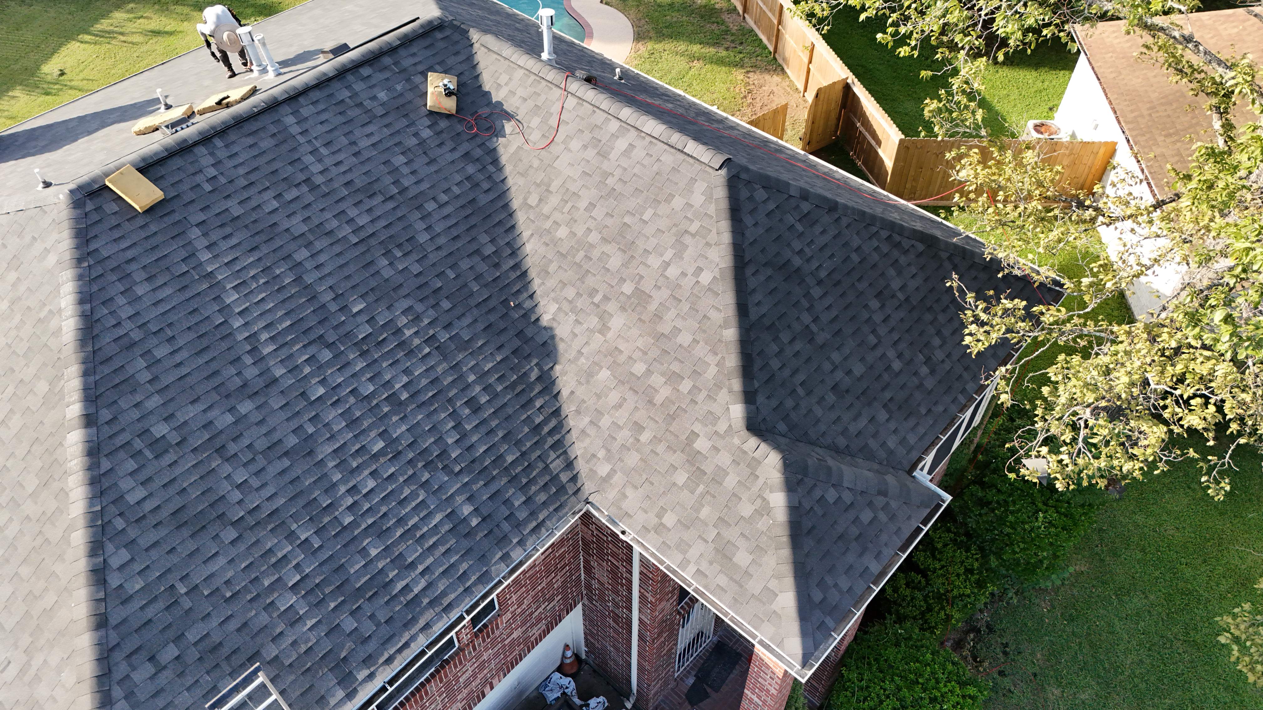 Charcoal Shingle Roof Replacement — North Houston, TX by PL Roofing & SB Roofing, LLC.