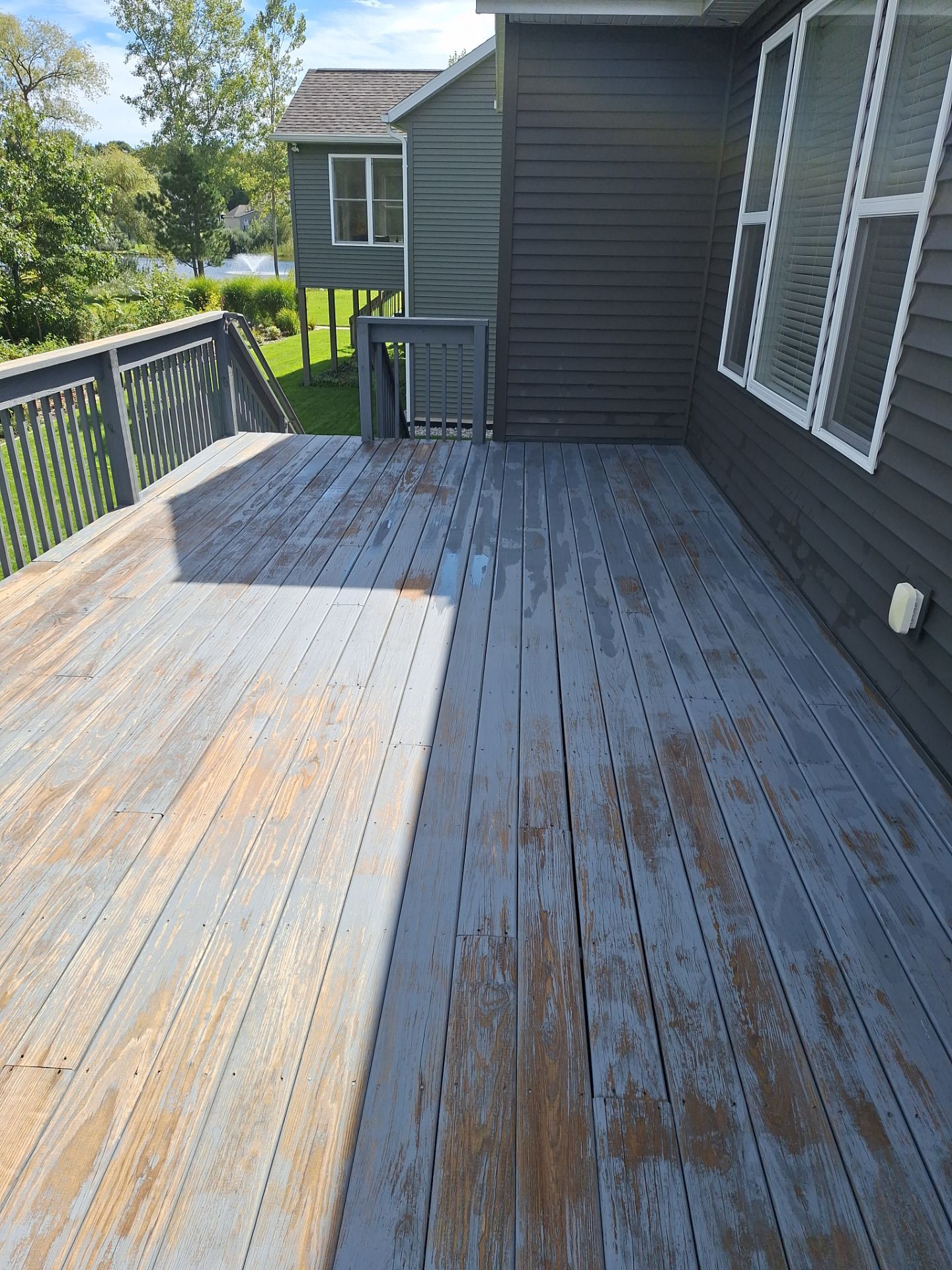 Solid Color Deck Staining for a Residential Home in Spring Lake by Gordon Painting