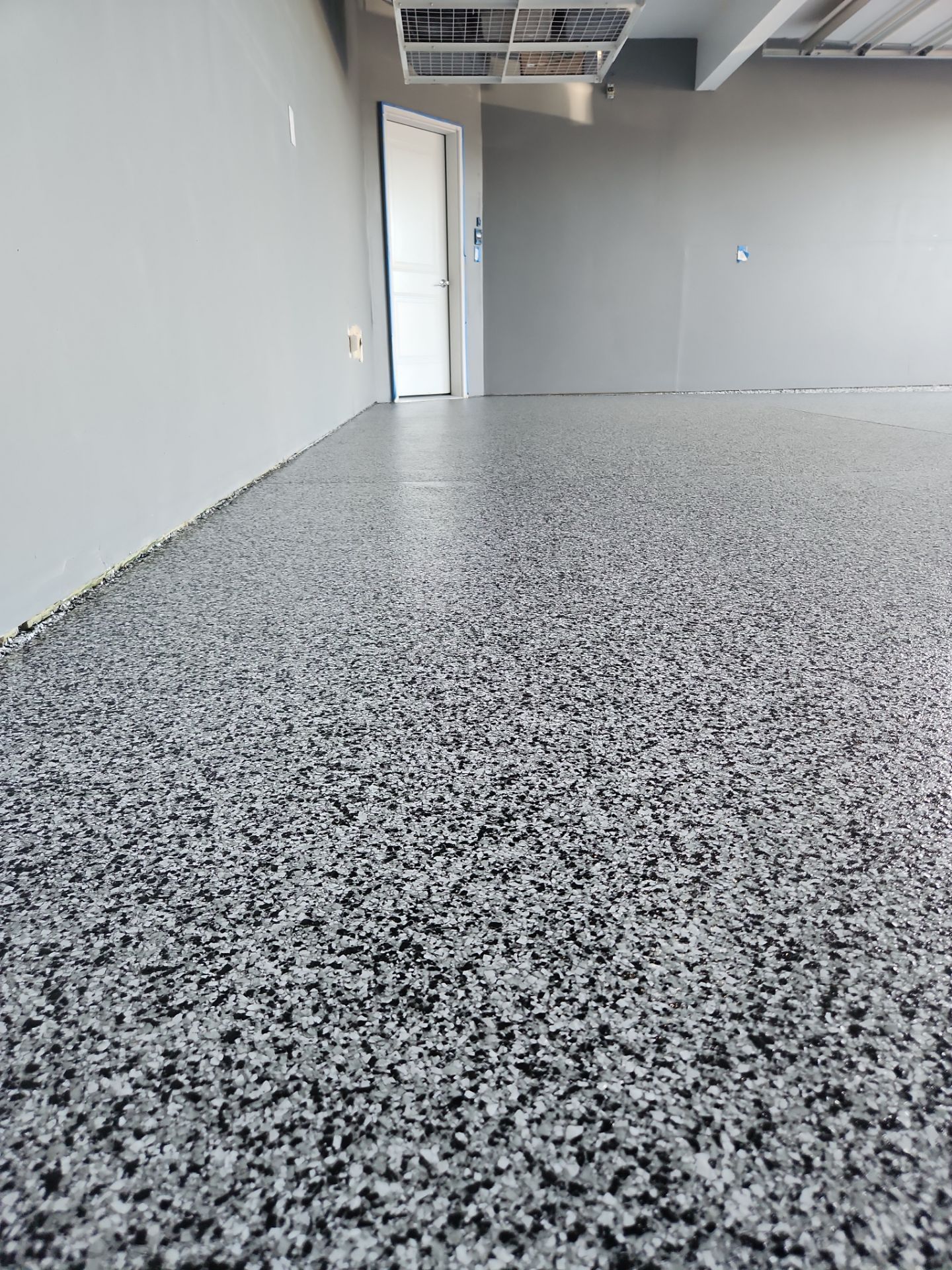Garage Transformation using Domino by Croc Coatings, LLC