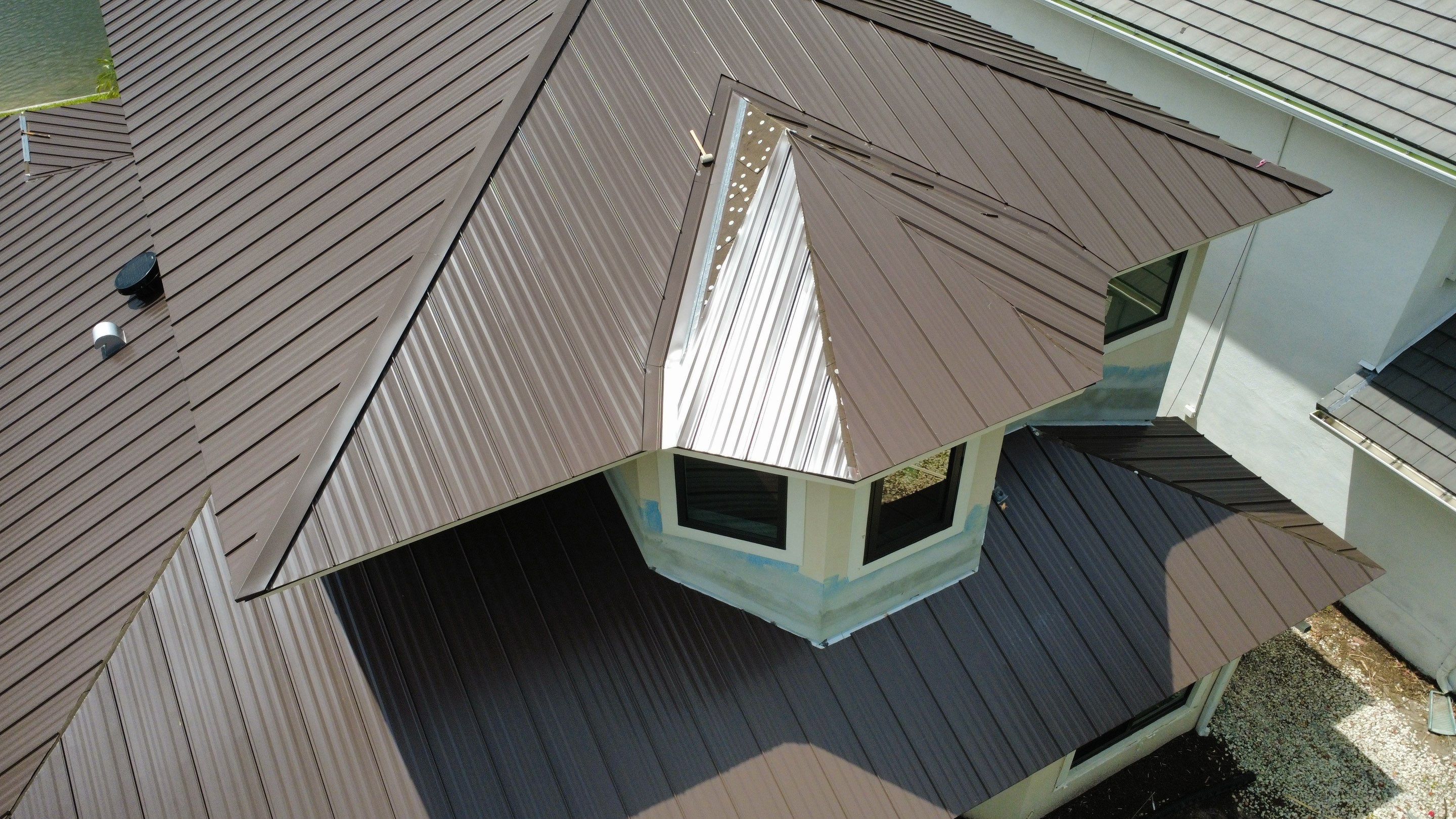 Residential Roofing Installation using 1" Nail strip metal roof by BLUES BROTHERS ROOFING