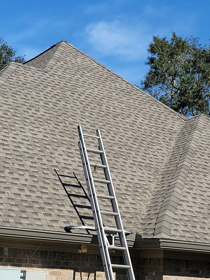 Residential Roofing Installation using Roof Replacement by American Roofing & Construction LLC