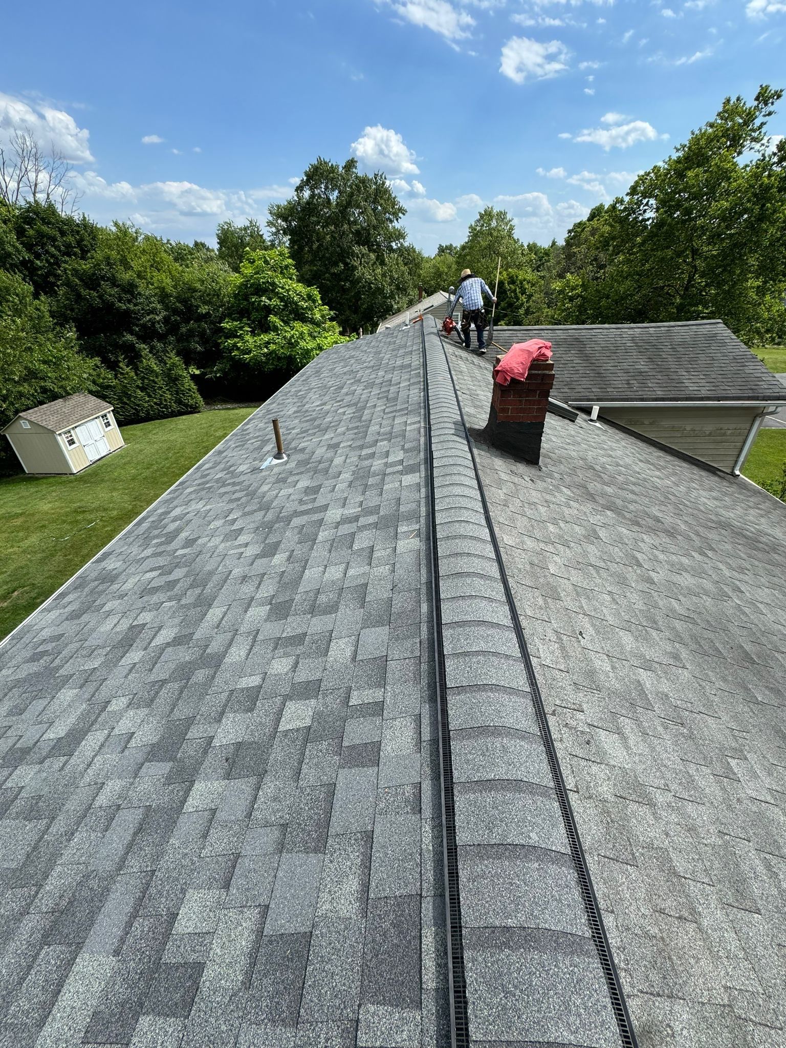 Estate Gray Shingles by Reimagine Roofing