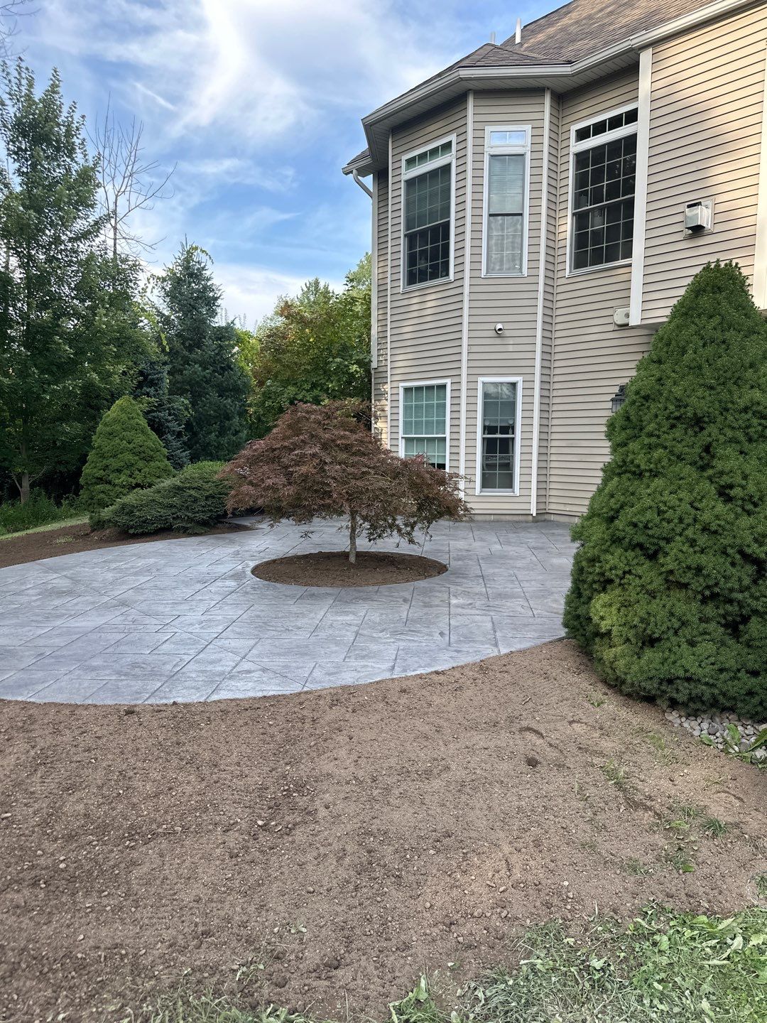 Majestic ashlar stamped concrete patio  by NG Masonry & Construction LLC
