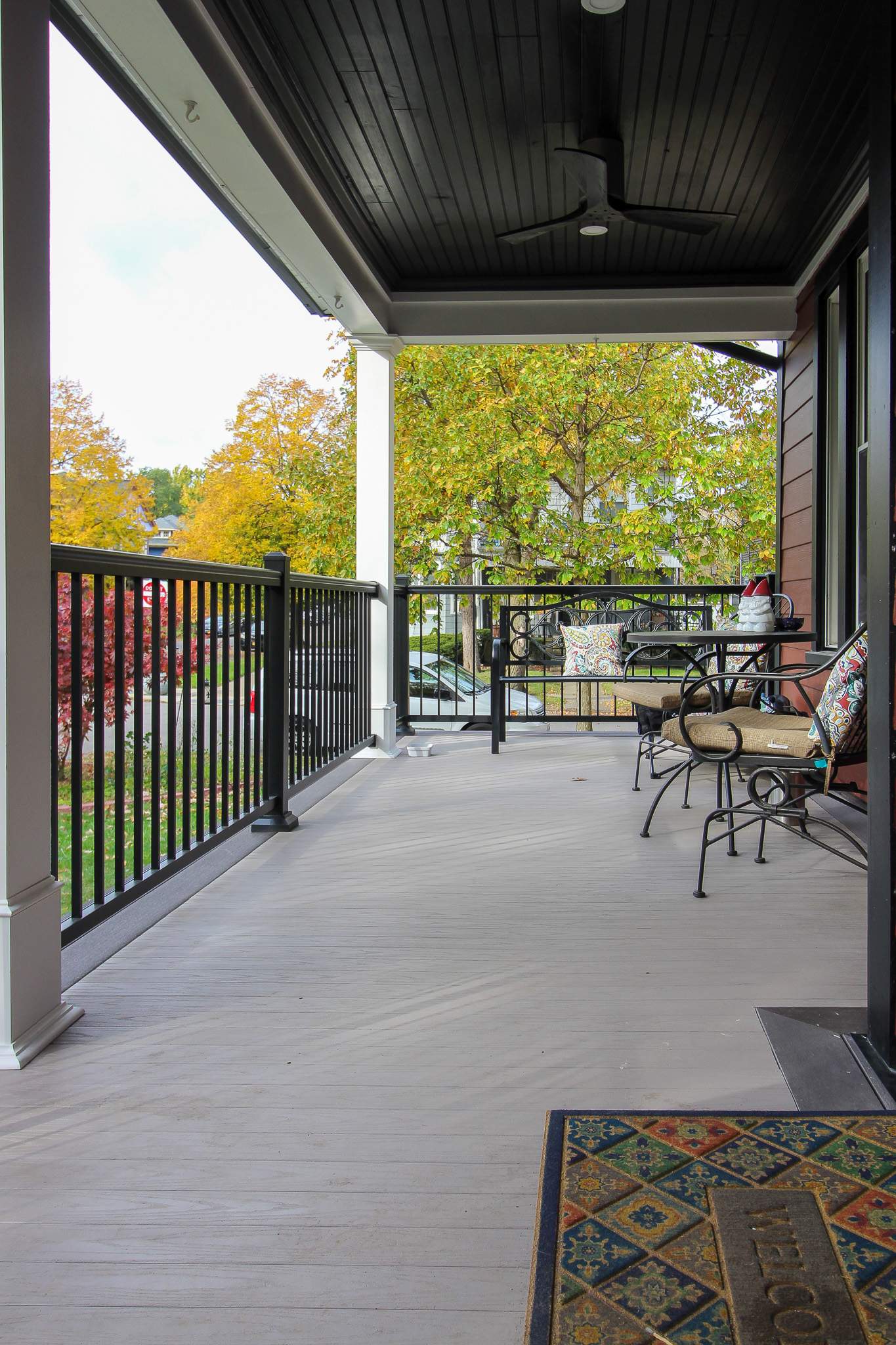 Exterior Renovations- Siding, Stamped Concrete, Porch, and Railings by Ivy Lea Construction
