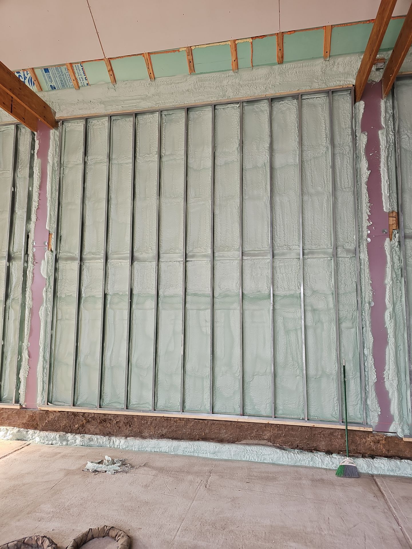 Exterior Installation using Closed Cell Spray Foam by NYS Foam & Energy