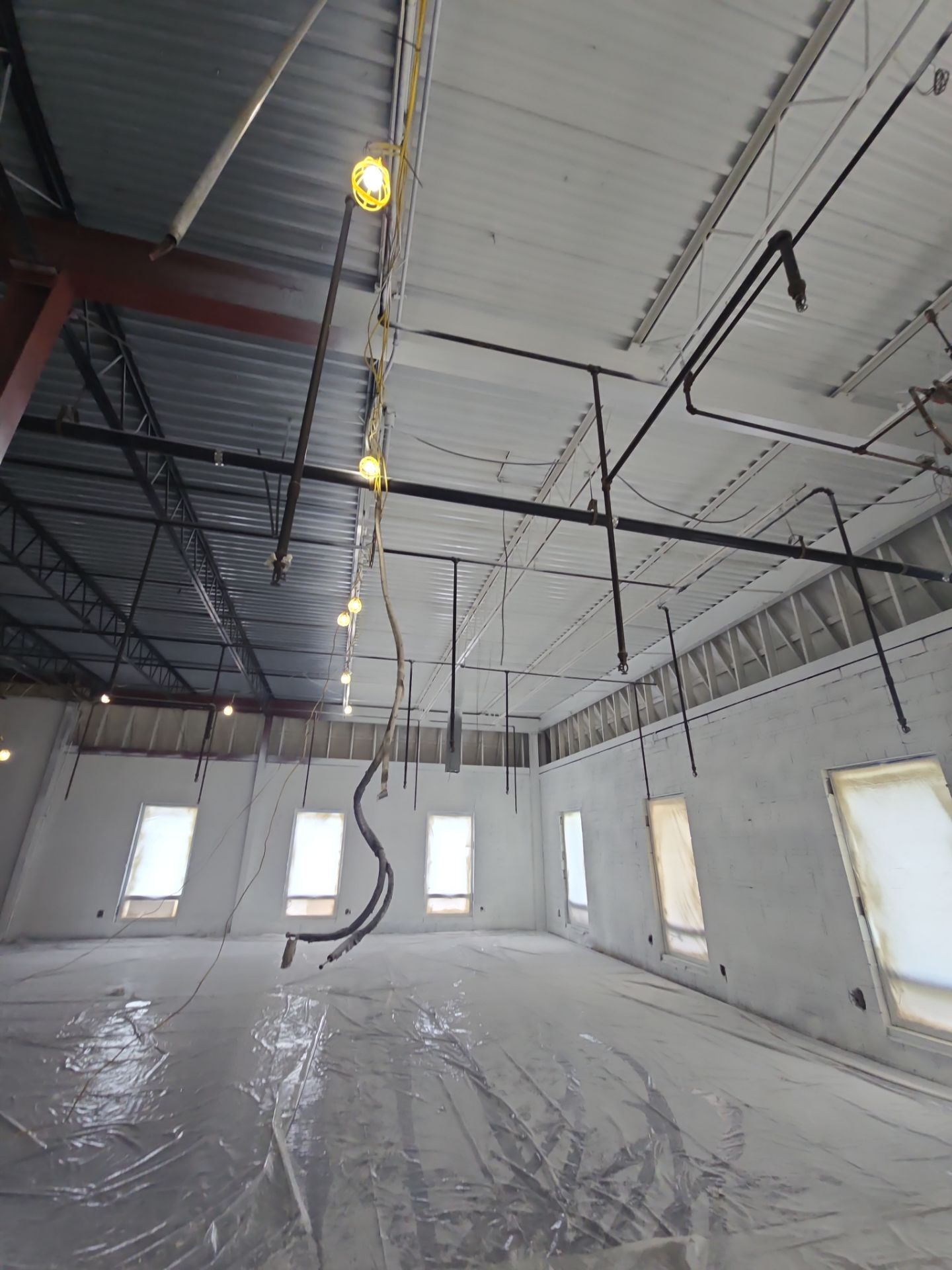 Industrial Warehouse Fire Damage Cleaning and Spray Sealing in Islandia by EMS Restoration Corp