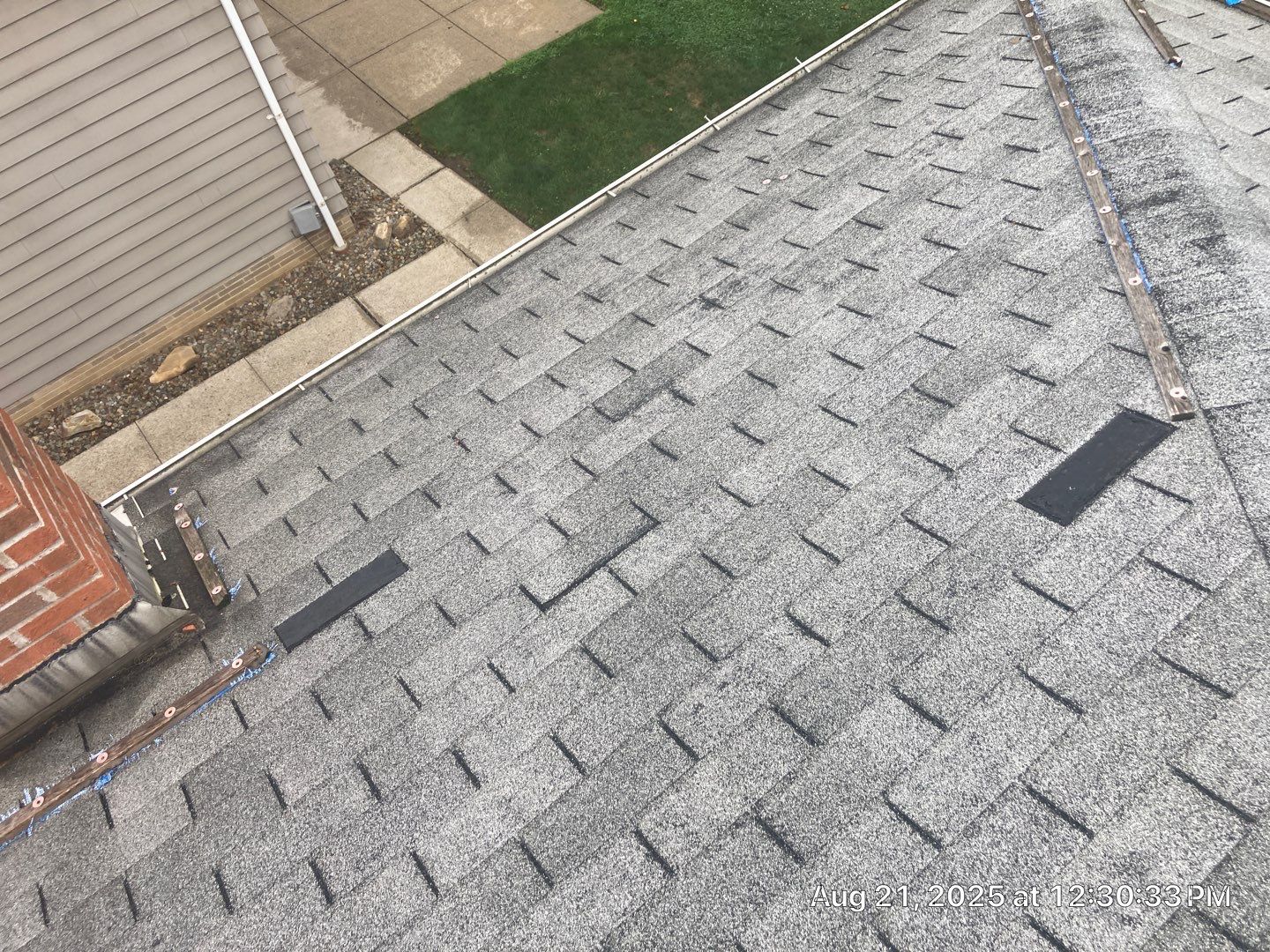 Shingle Roof Replacement by Absolute Roofing and Construction
