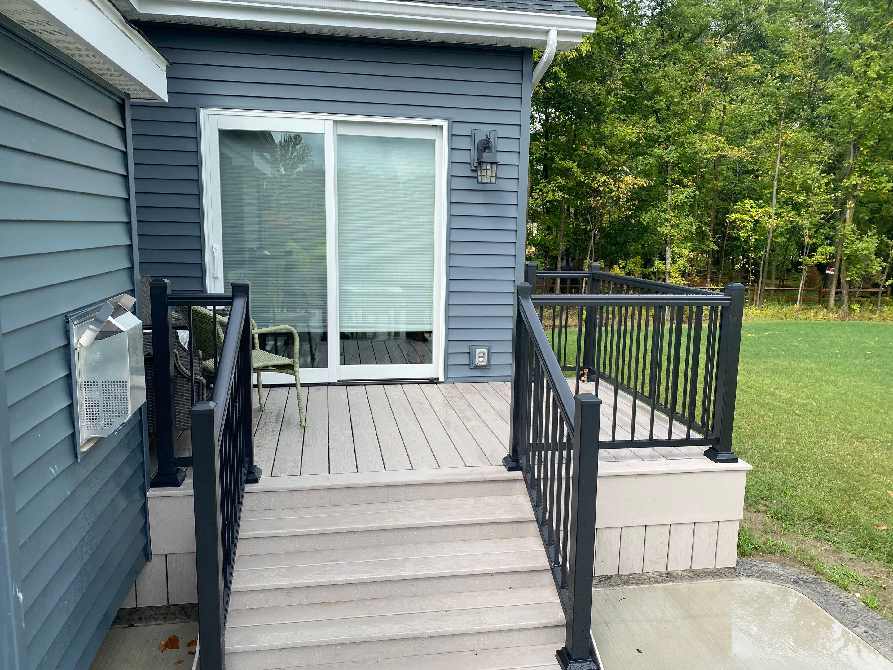 Outdoor Living- Deck and Concrete by Ivy Lea Construction