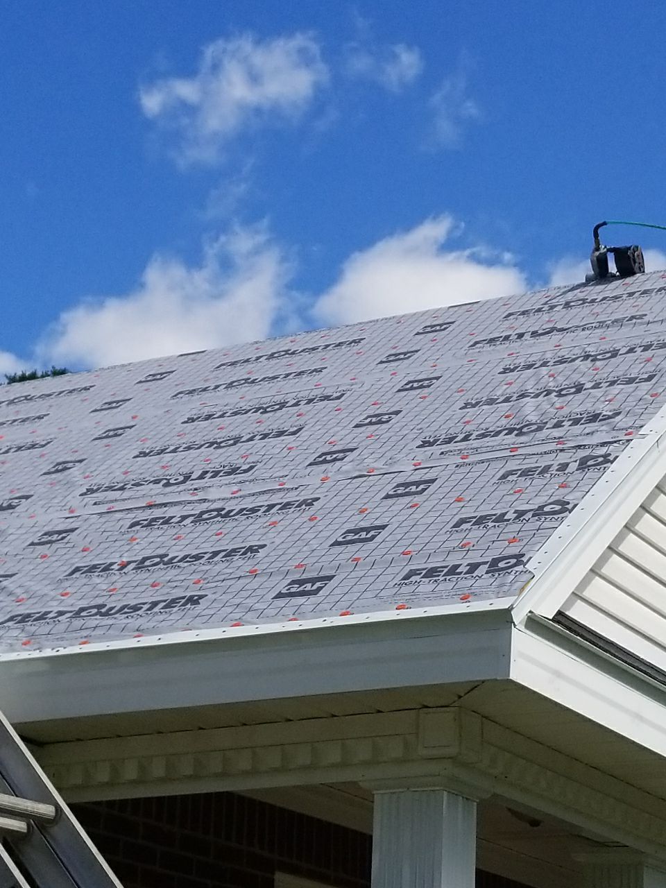 Residential Roofing Installation using Roof Replacement by American Roofing & Construction LLC