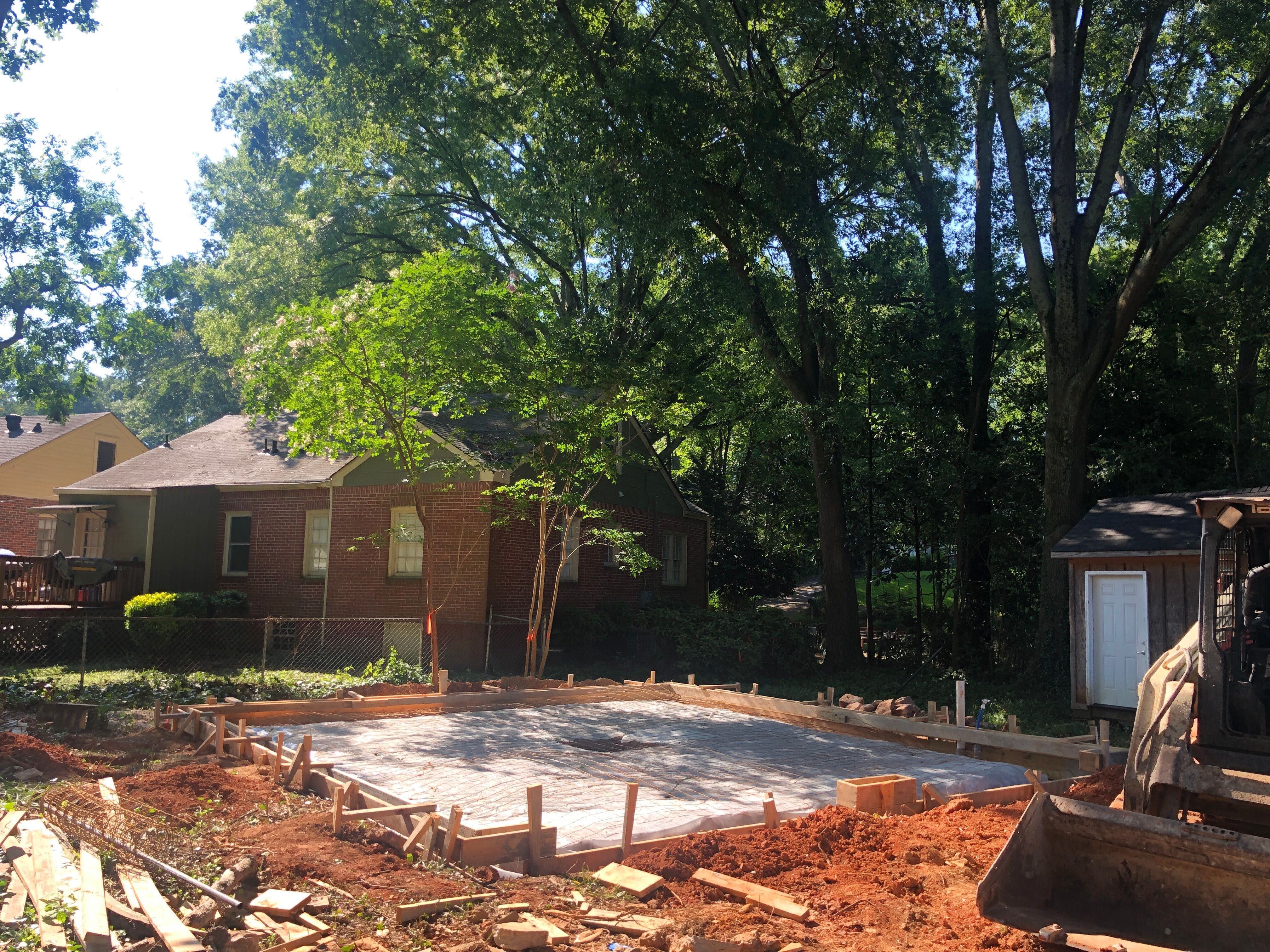 Custom Two-Story Brick Garage and Studio Apartment in Decatur by Swift Home Renovations 