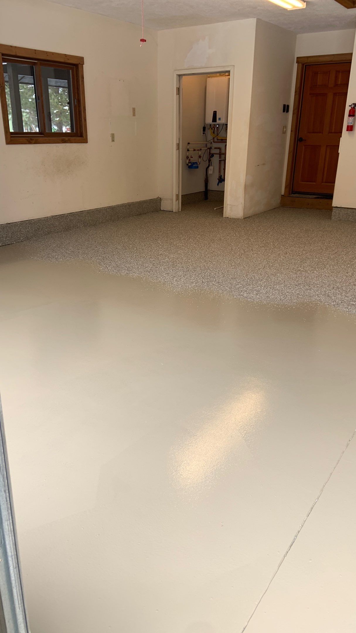 Garage Transformation using Pebble Beach by Croc Coatings, LLC
