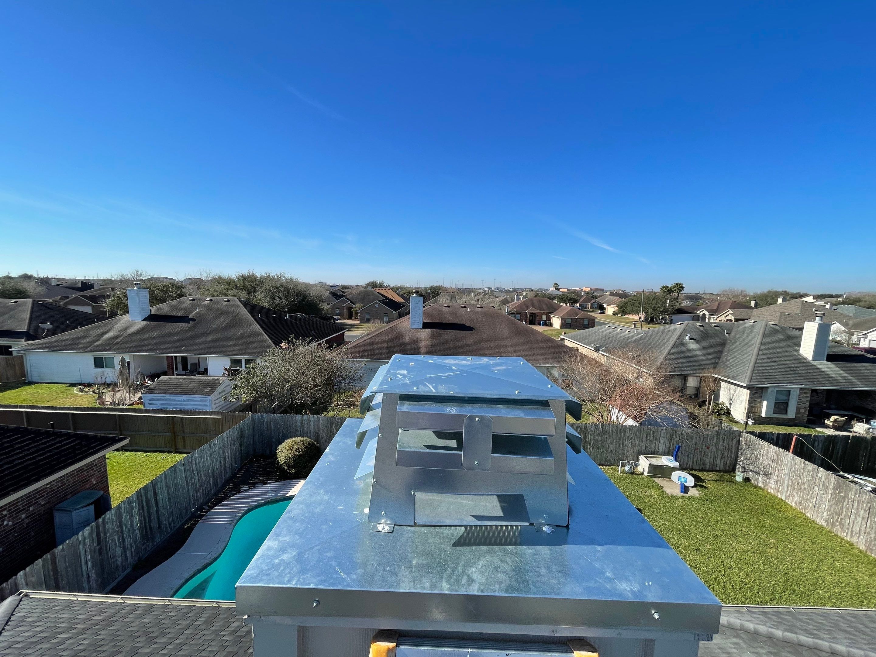 Residential Roofing Repair Replacing Chimney Cap by Lighthouse Roofing