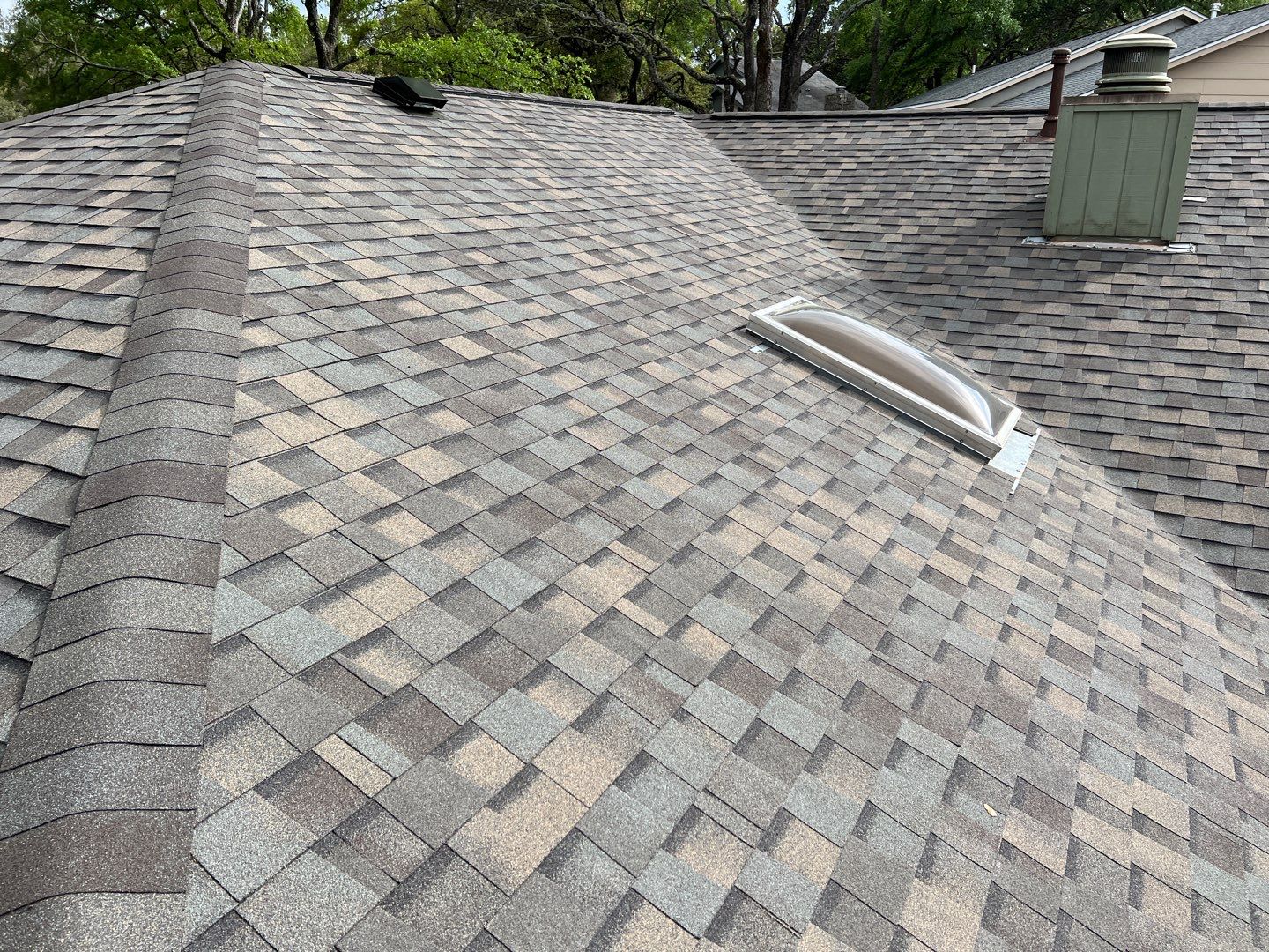 Winter storm 2023 with tree damage by Oakwood Roofing and Construction, LLC