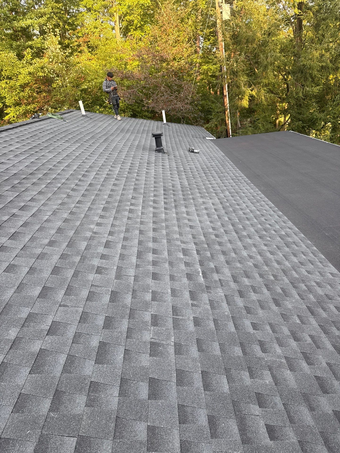 Residential Roofing Installation using GAF Timberline HDZ Charcoal by Rainstoppers Roofing
