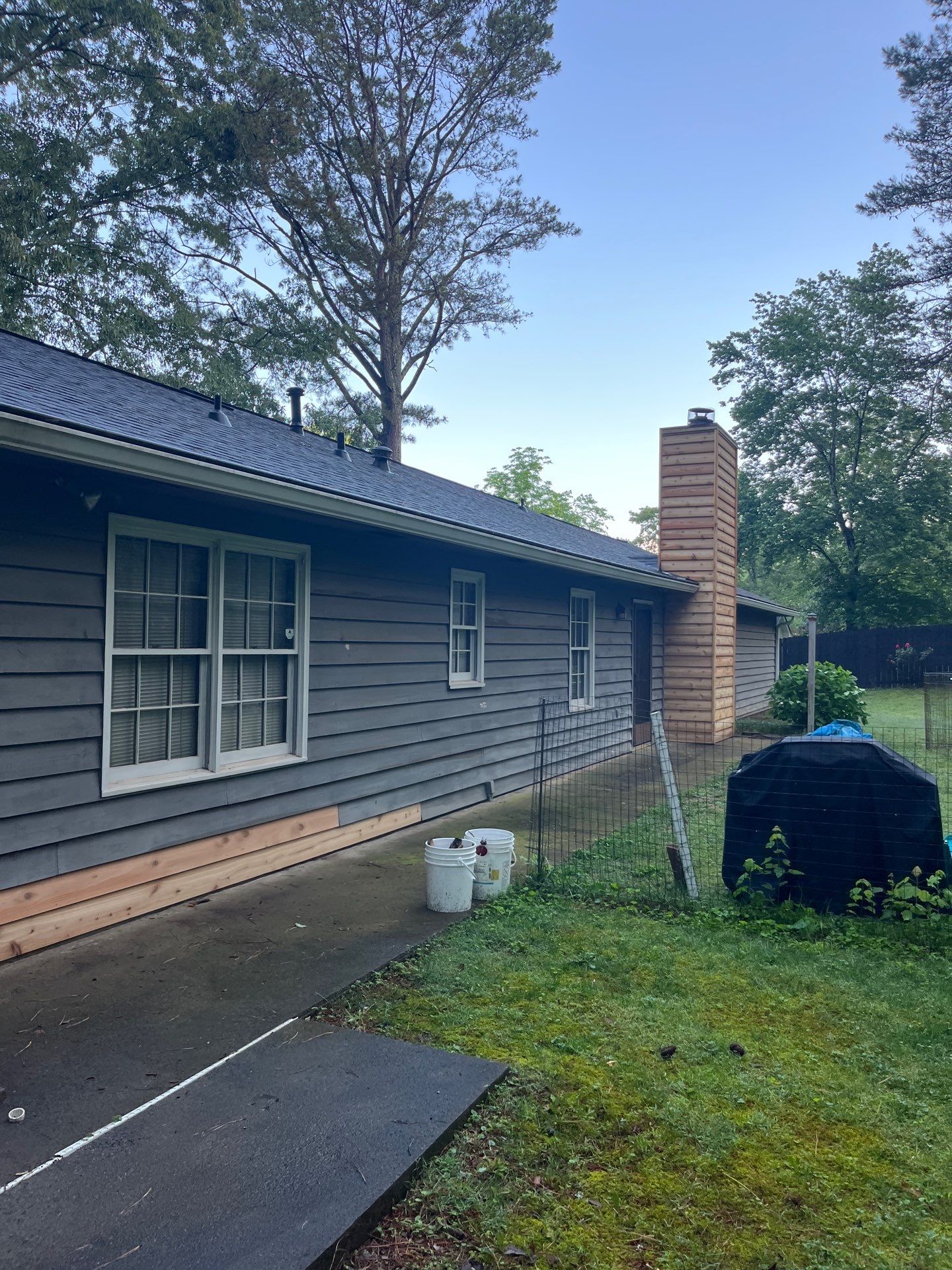 Marietta, GA Exterior Painting Transformation with Blue Paint by Nelson Exteriors