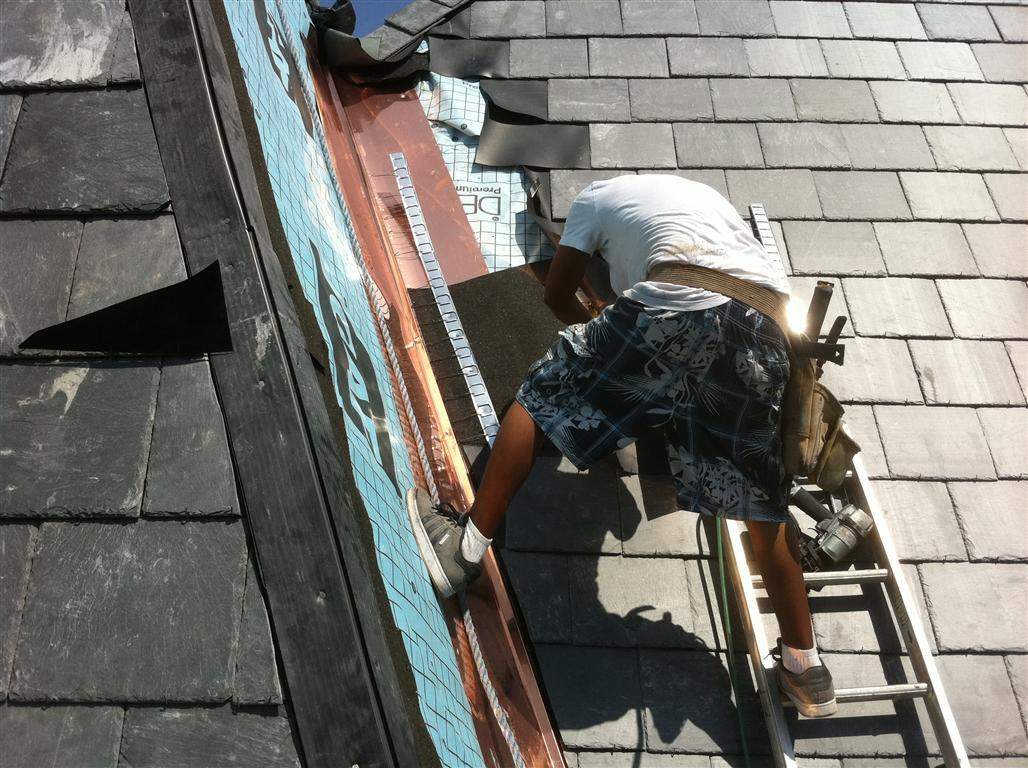 Historic Building ROOF REPLACEMNT with GAF TruSlate  on steep slop and Versico 60mil TPO on flat roof by Gorilla Exteriors Contracting, LLC