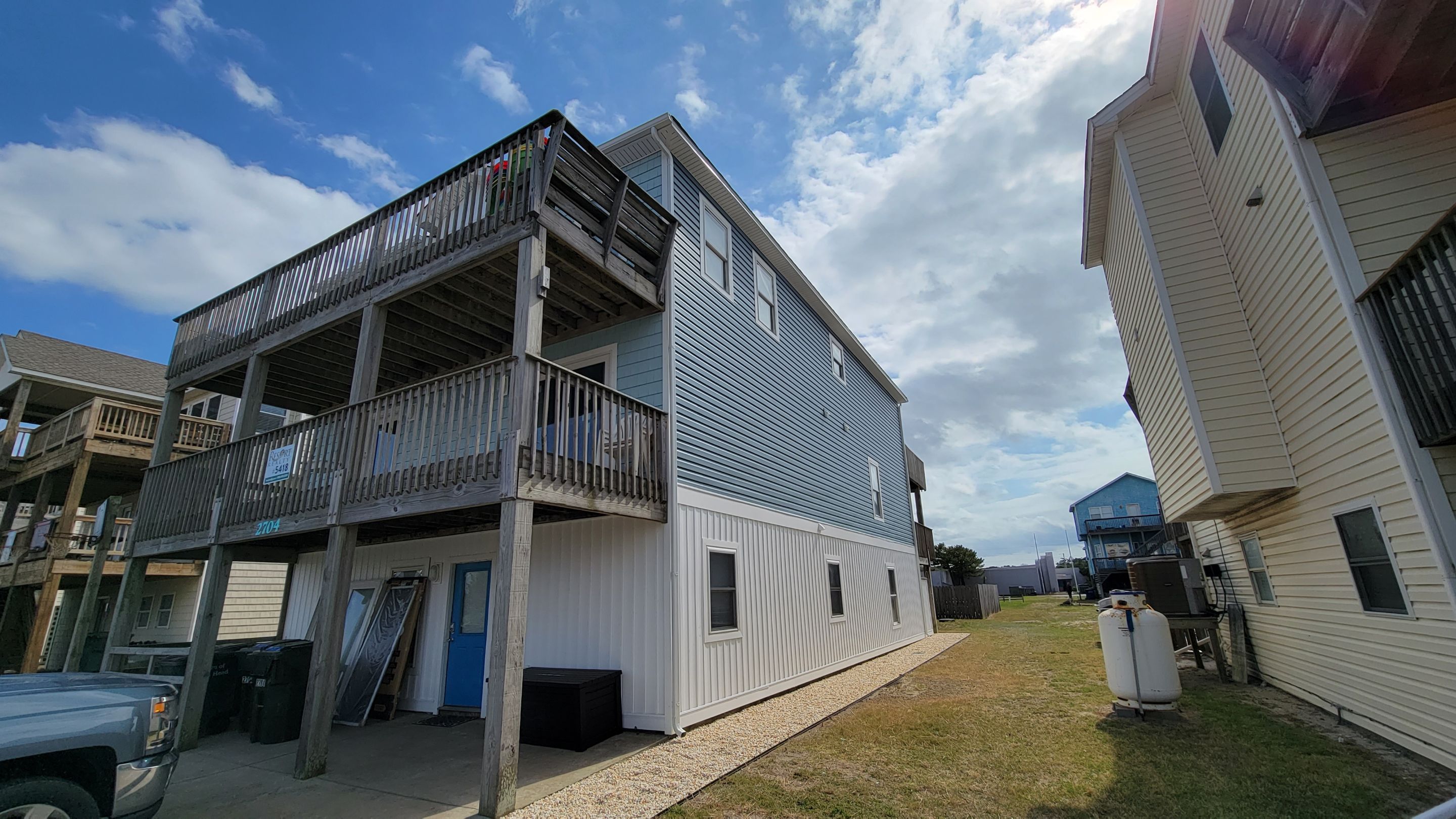 From Bland to Blue by Gallop Roofing & Remodeling, Inc.