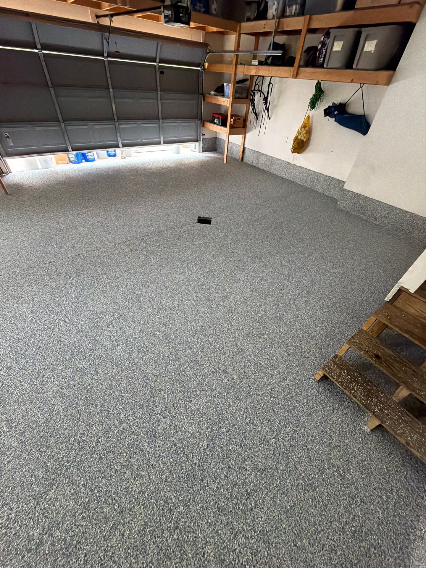 Custom Tidal Wave Epoxy Flake Floor Installation in Norton Shores. by Gordon Painting
