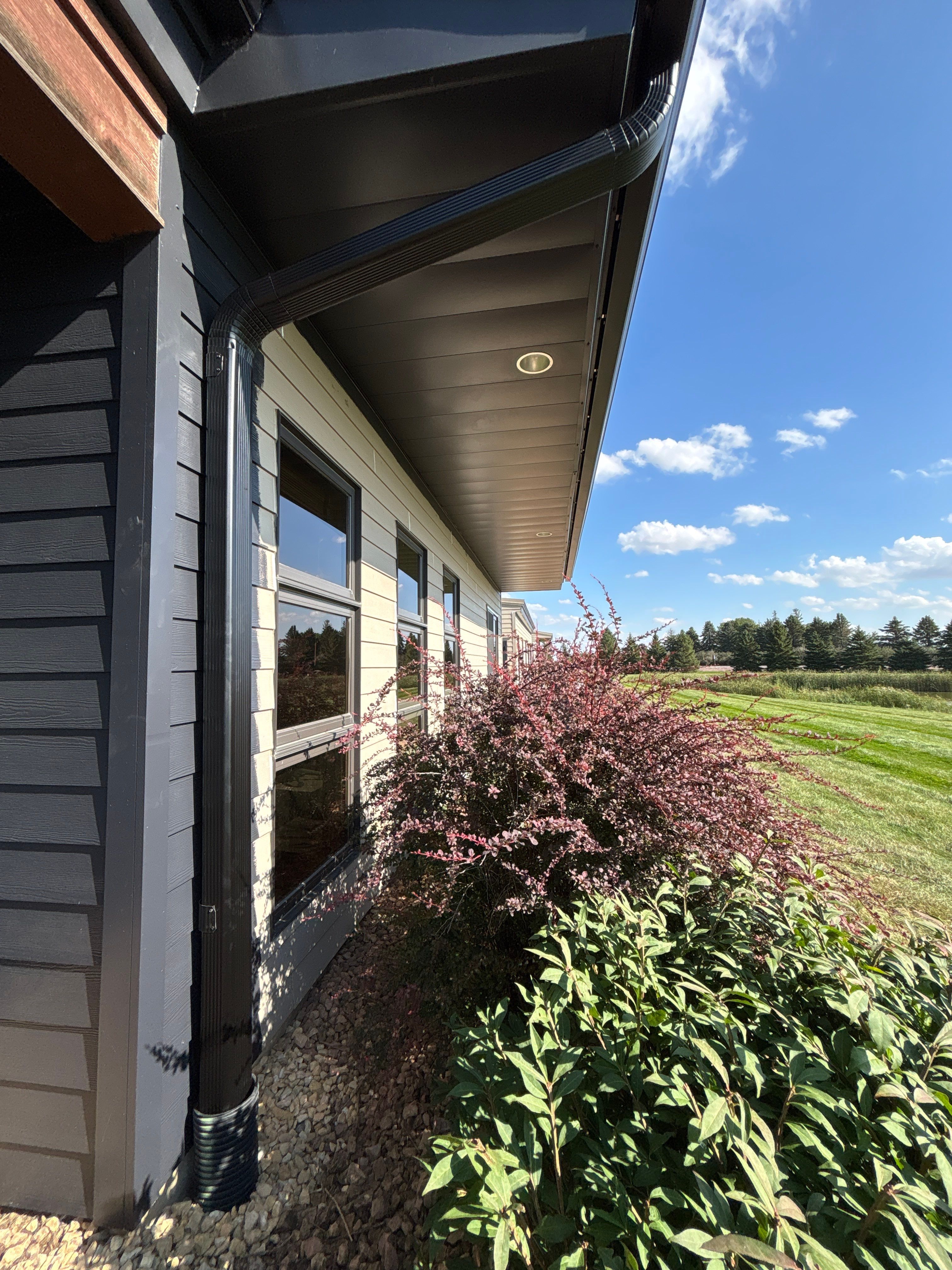 6-Inch Black Commercial Seamless Gutters  with Snow Rails– Sleepy Eye, MN by Next Level Seamless Gutters / Exteriors Inc.