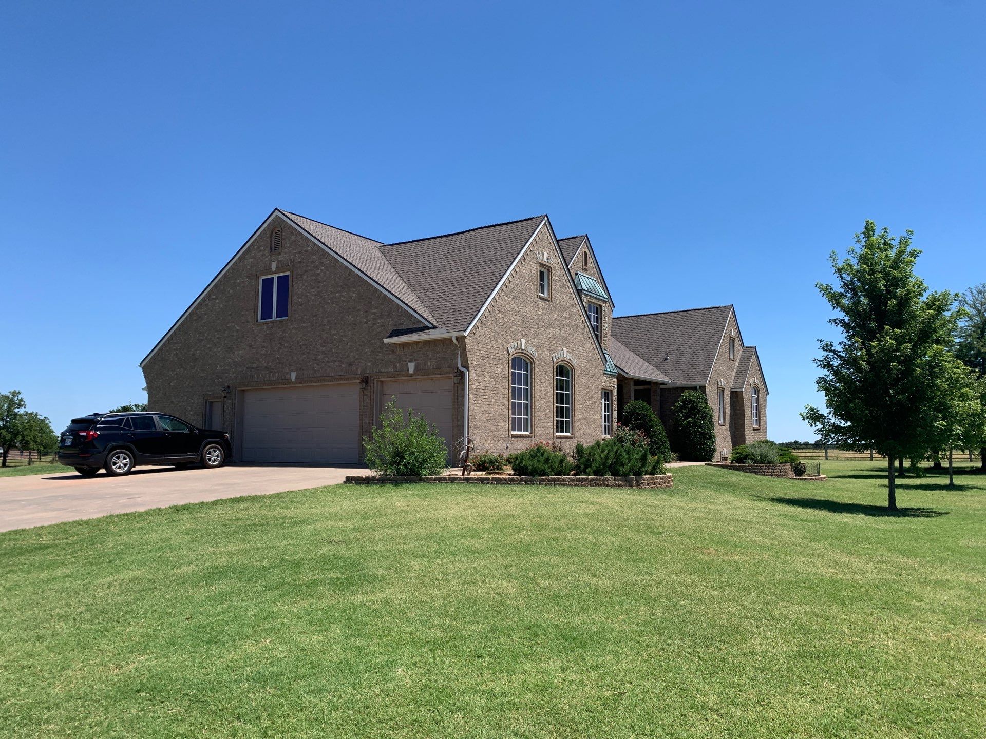 Roof Replacement and Gutter Installation in Edmond, OK by McCann's Roofing and Construction