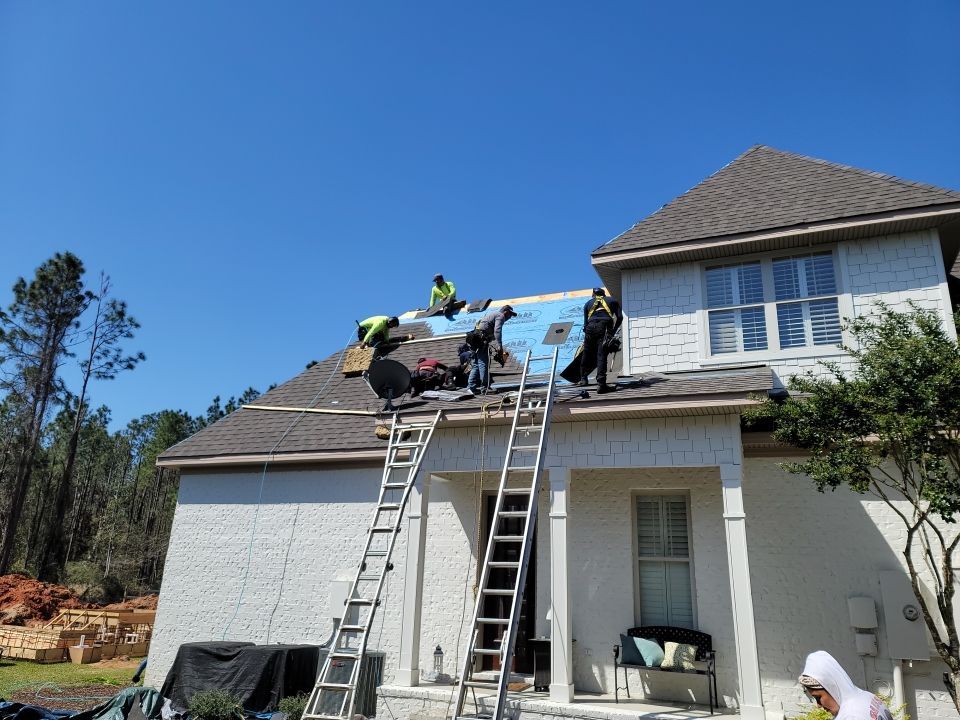 Residential Roofing Installation using Roof Replacement by American Roofing & Construction LLC