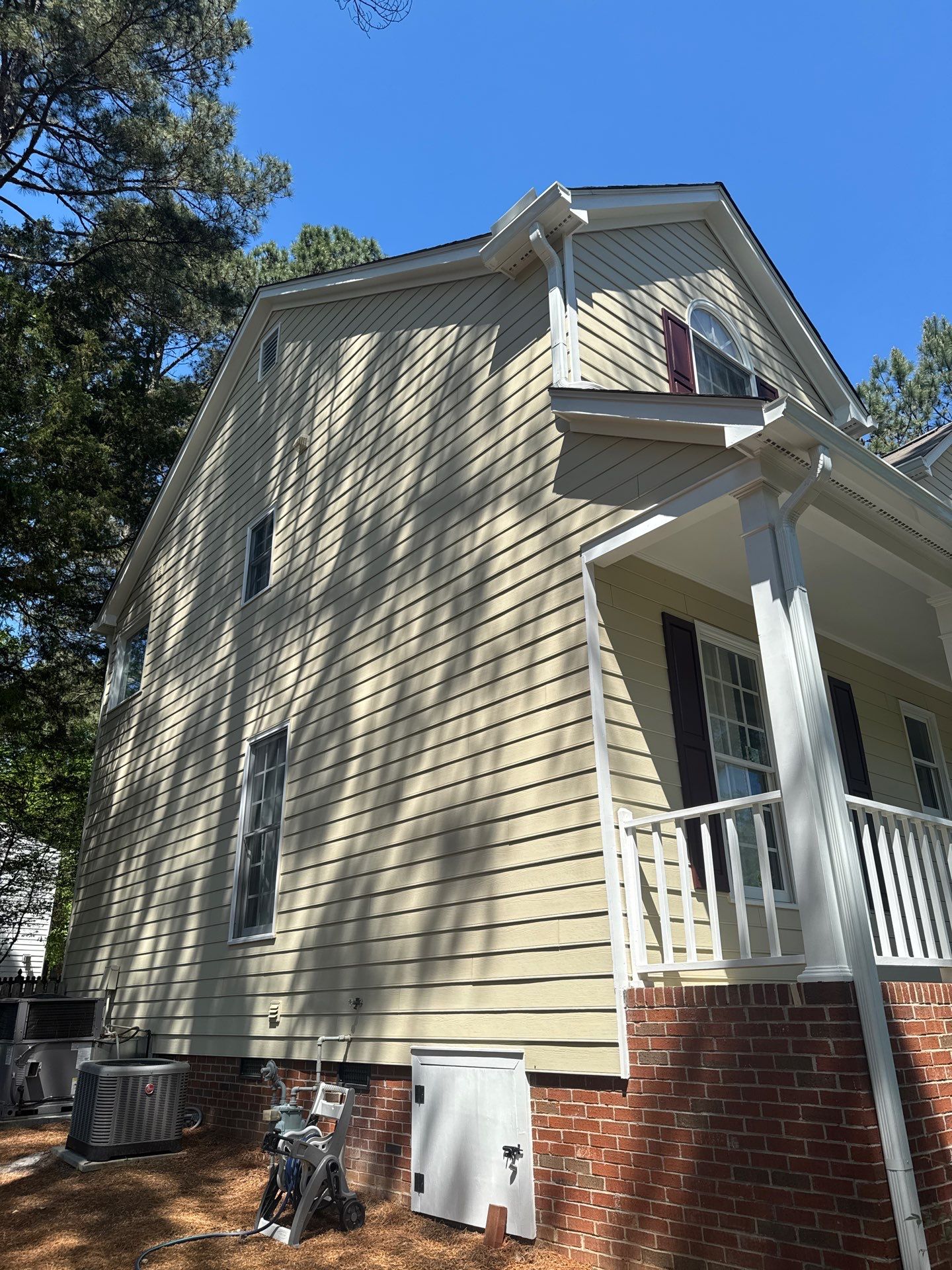 Exterior paint and siding replacement by GonzalezPainters & Contractors Inc 