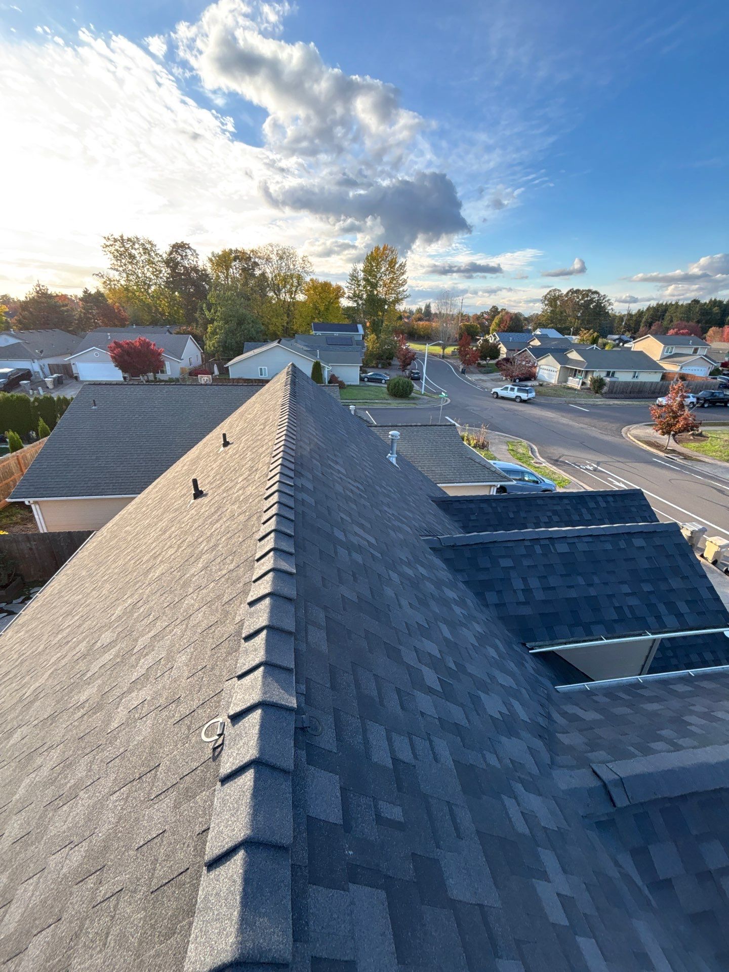 Granite Black Residential Roof Replacement by Orezona Building & Roofing Company, Inc.
