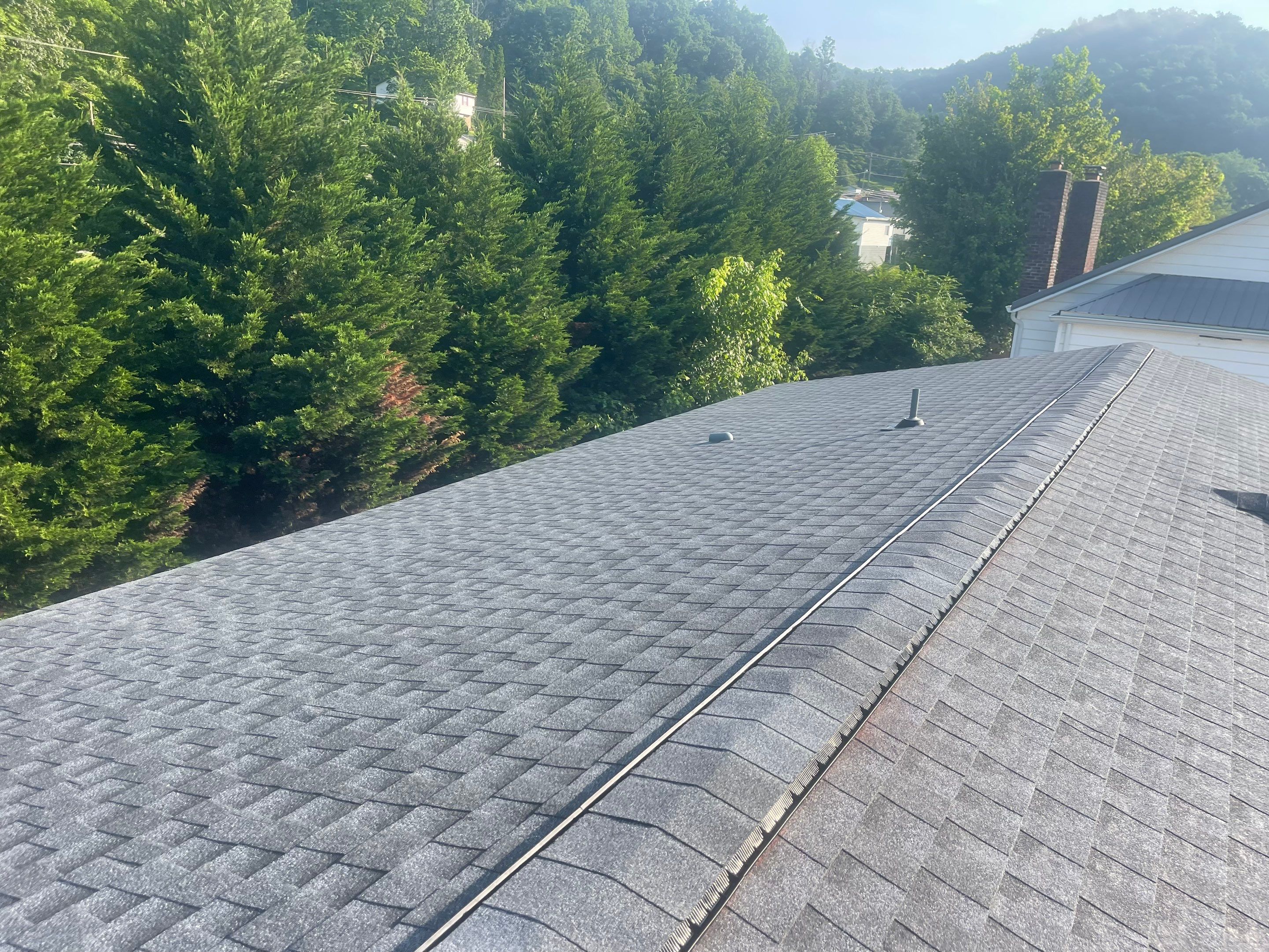Residential Roofing Installation using GAF Timberline HDZ Pewter Gray by Rainstoppers Roofing