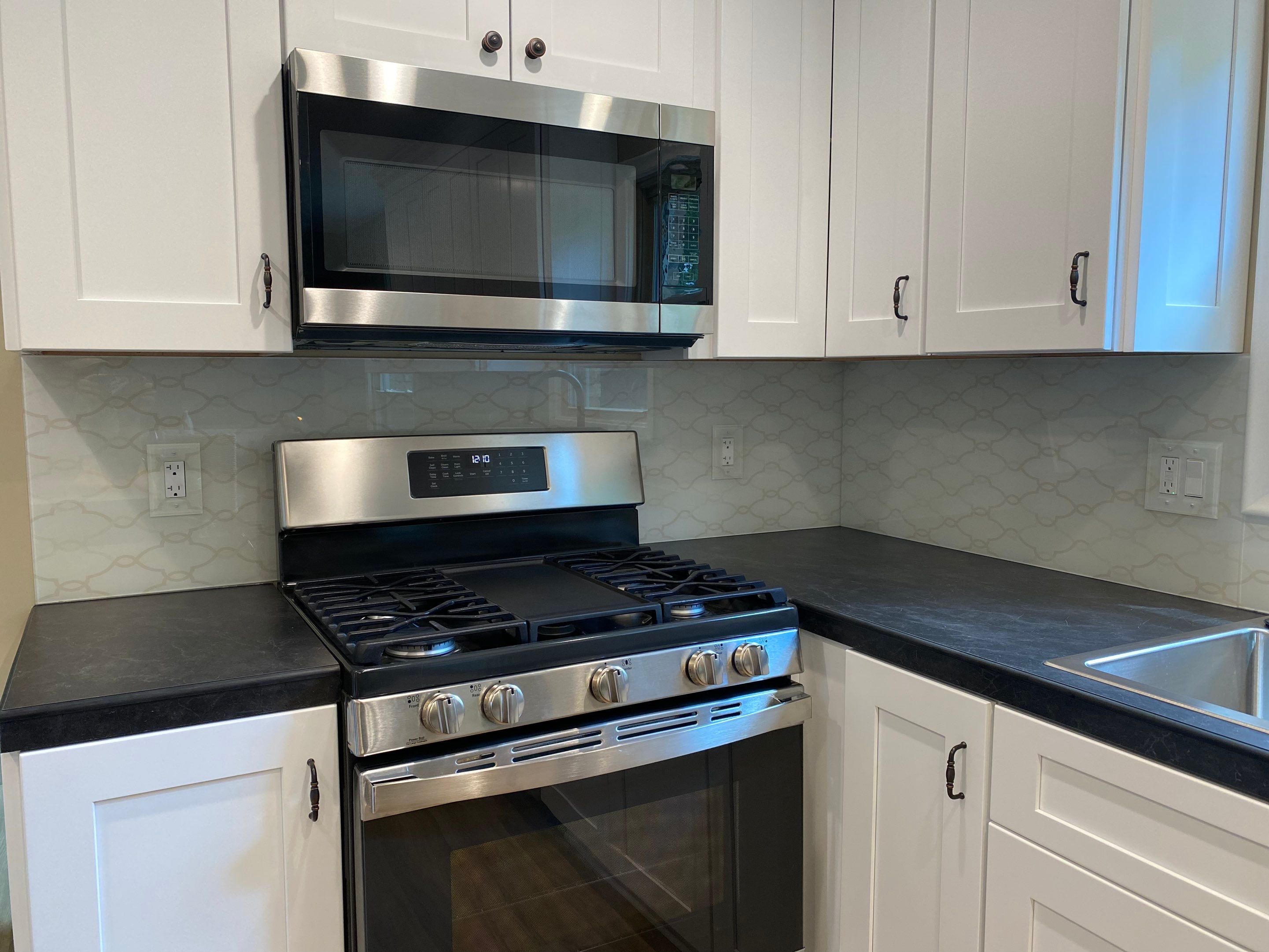 Kitchen Remodel using IMAGIO Arabesque Drops Solid Glass Backsplash by IMAGIO