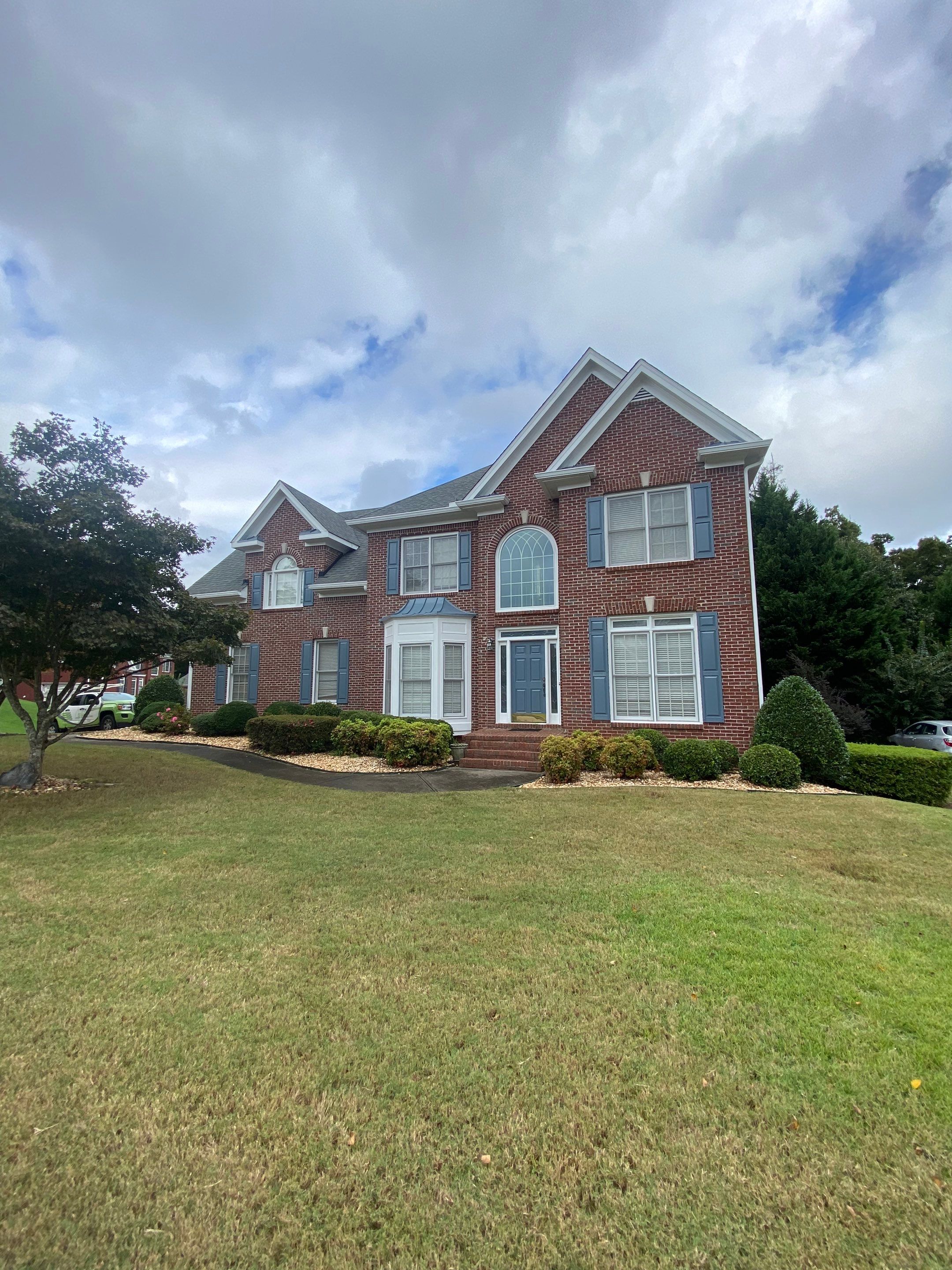 Exterior Painting and Trim Refresh for Duluth Brick Home by Swift Home Renovations