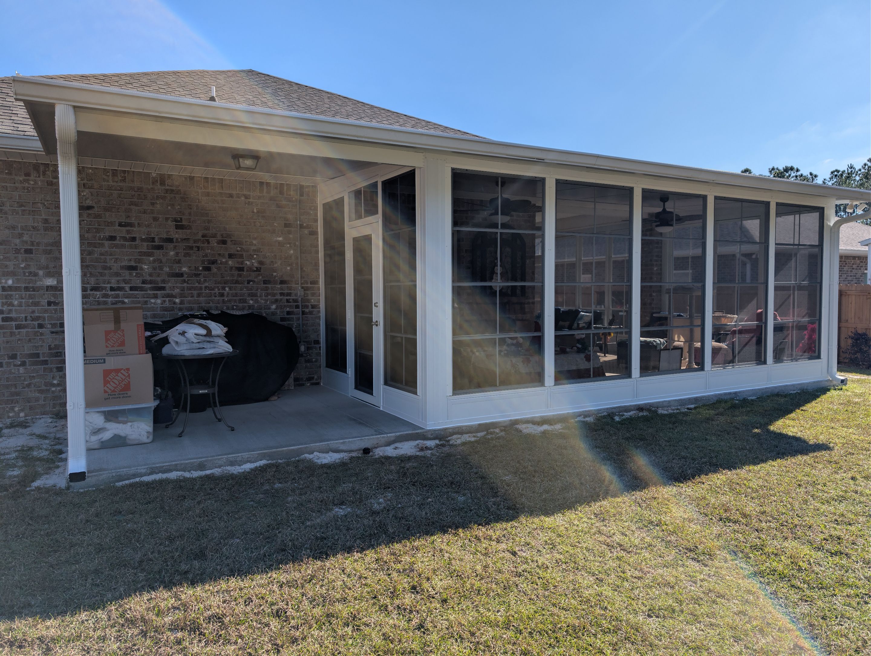 Home addition w/Vinyl 4-Track Windows by Titan Sunrooms