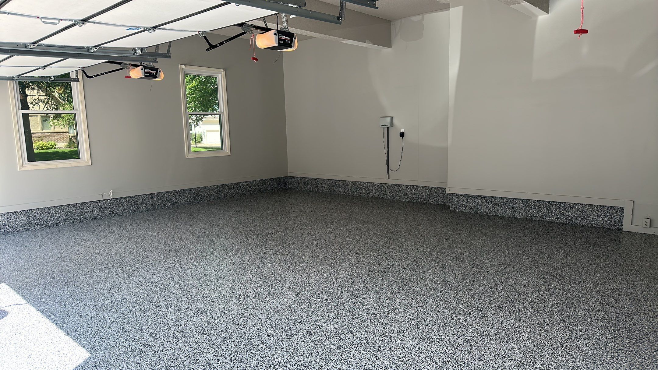 Julie H. upgraded her garage with our cabinets and wall storage options  by Banner Garage