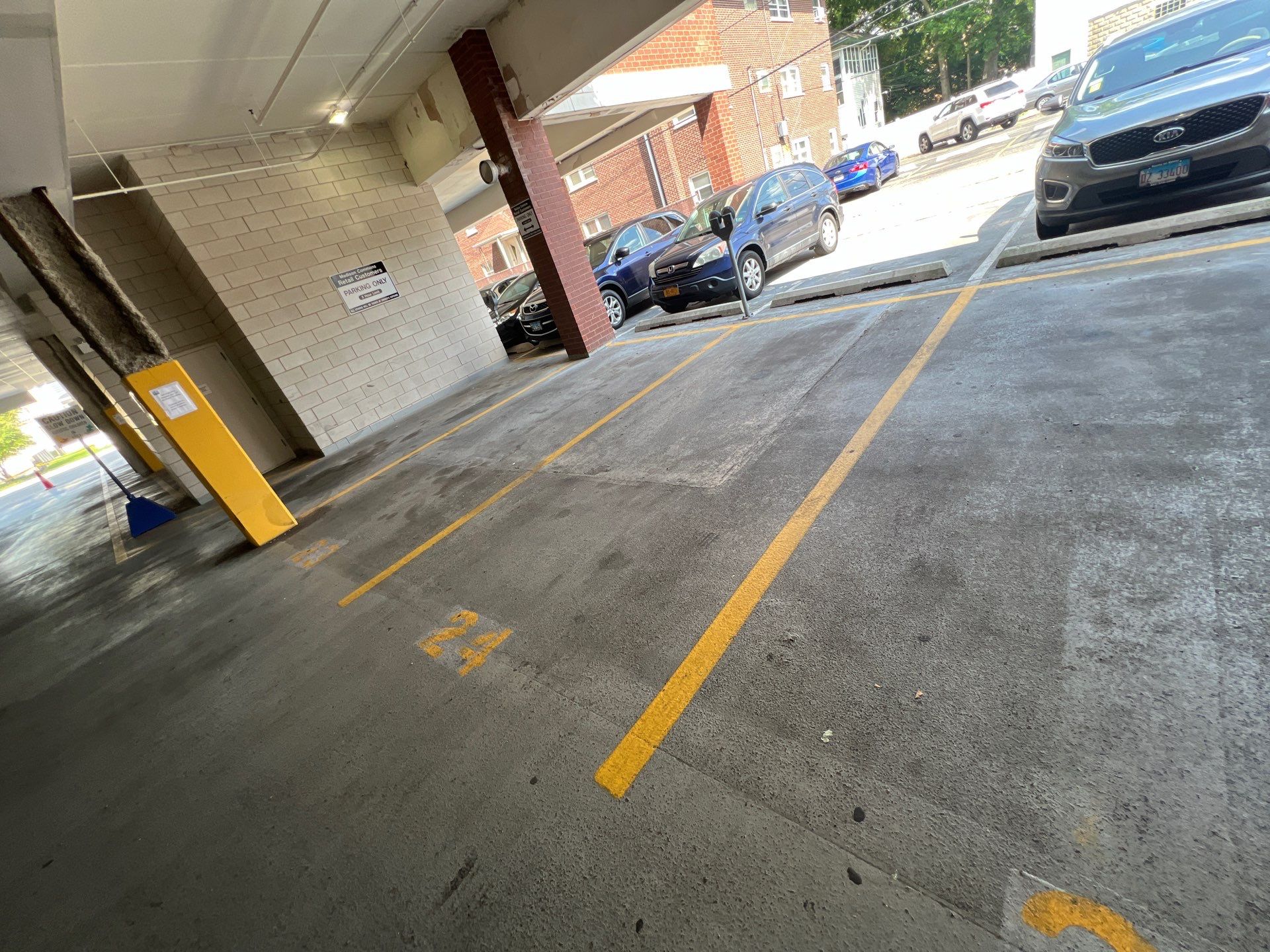 Parking garage using Hot water by Northern Power Washing LLC.