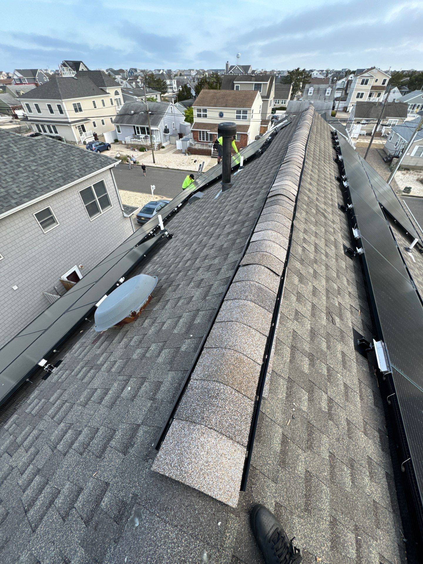 Estate Gray Shingles by Reimagine Roofing