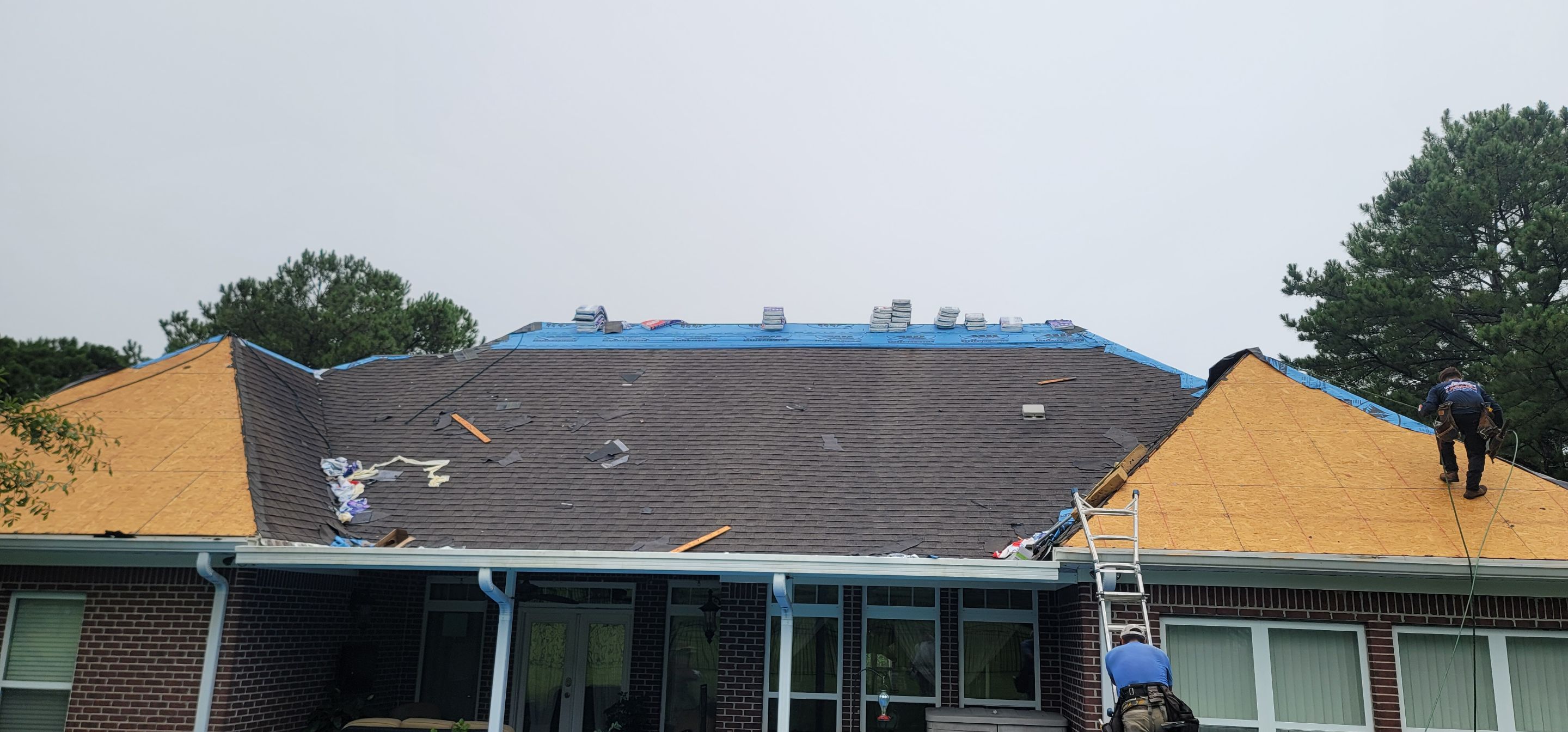 Residential Roofing Installation using Roof Replacement by American Roofing & Construction LLC