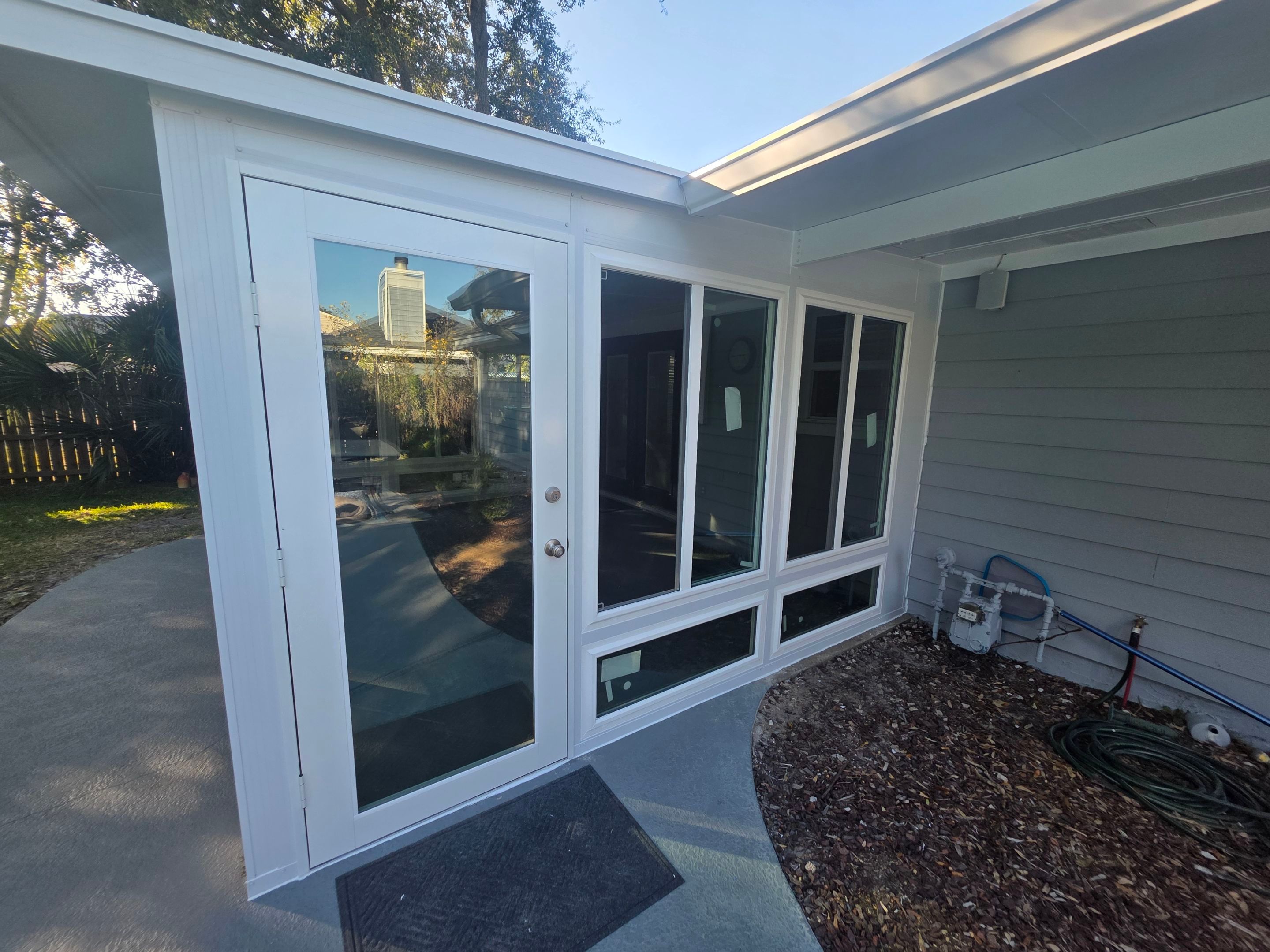 Patio Cover to Glass Room in Mary Esther, FL by Titan Sunrooms
