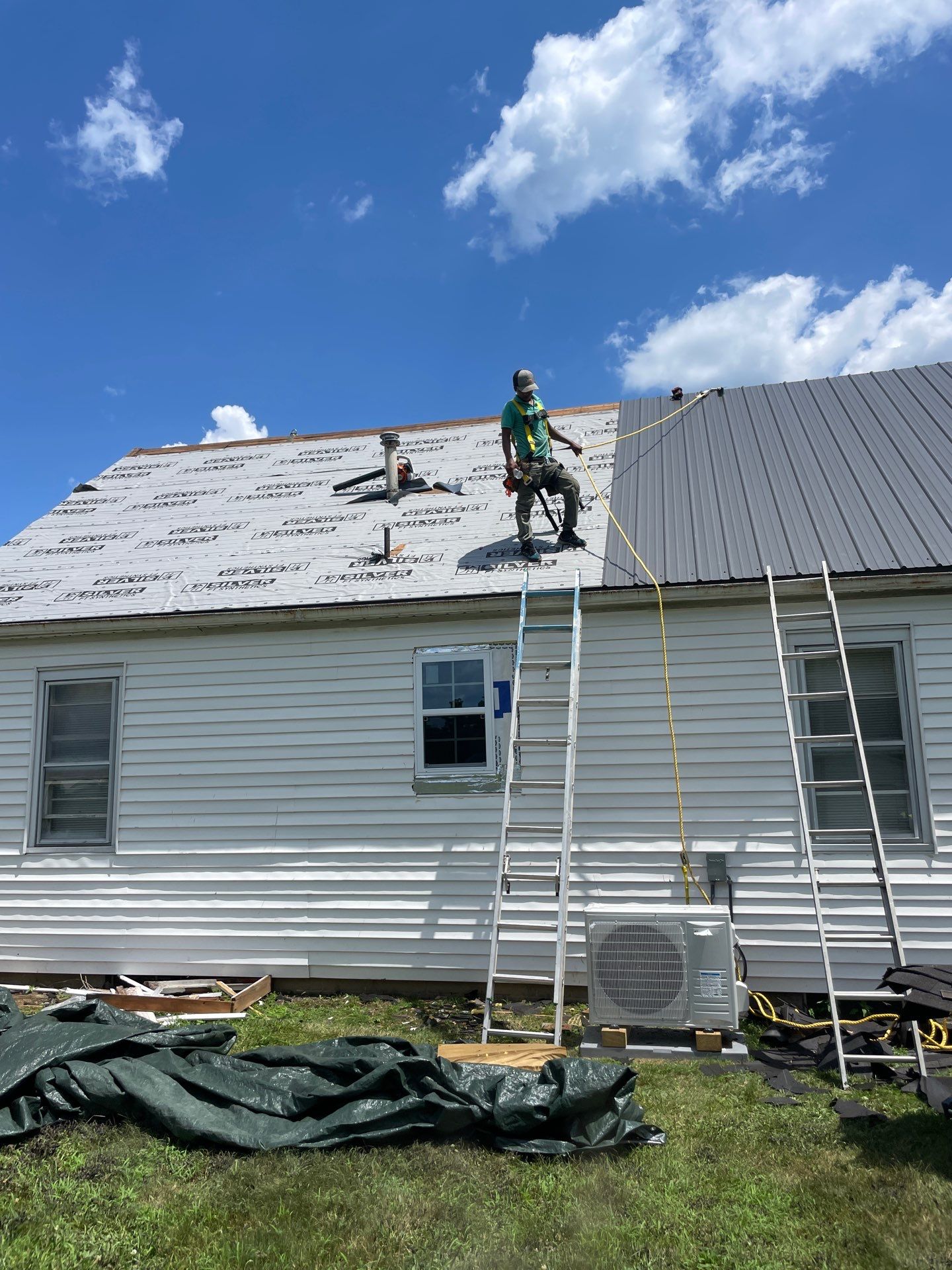 Residential Roofing Installation using Metal by Rainstoppers Roofing