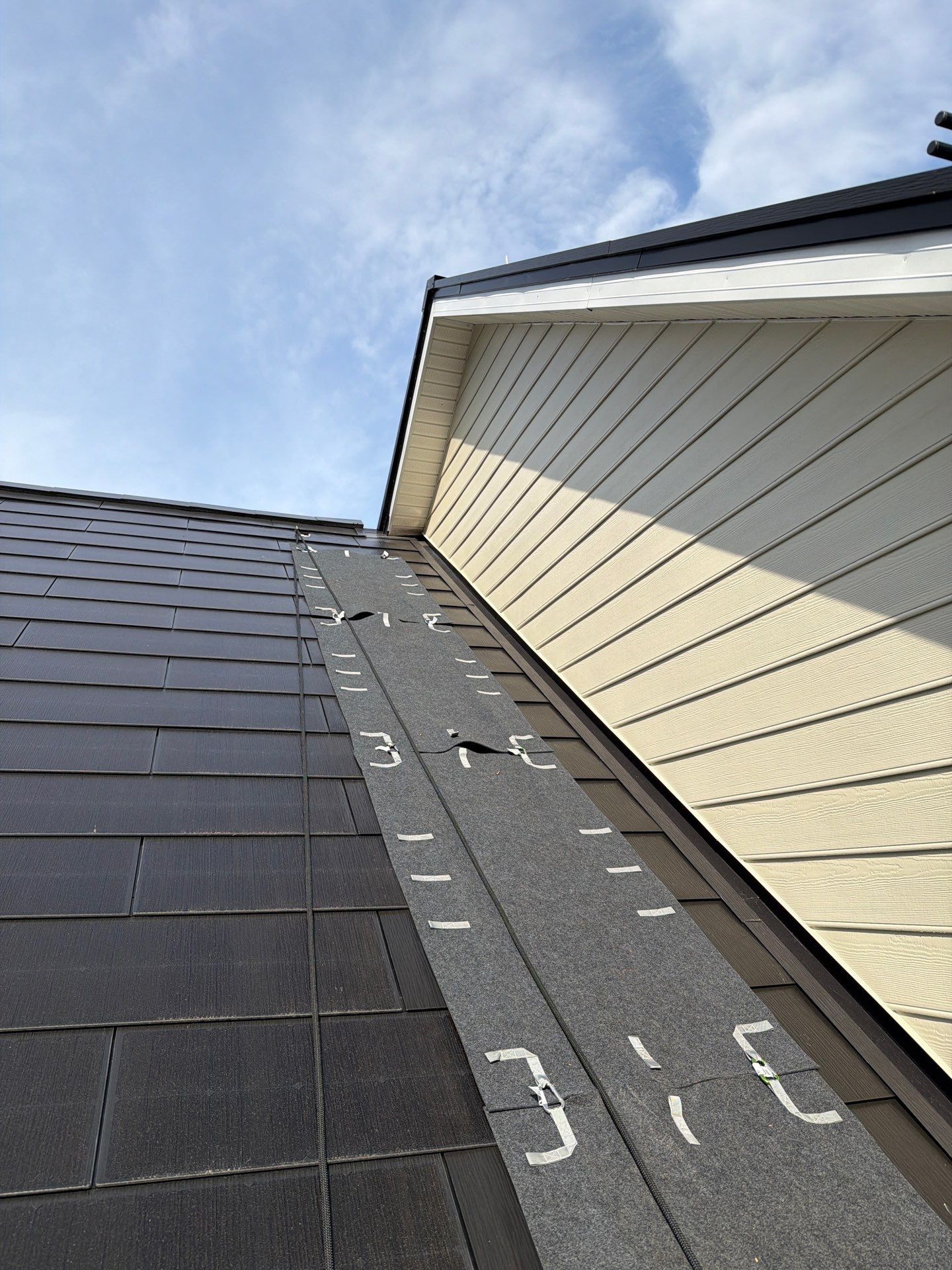Beautiful James Hardie Siding & Tesla Solar Roof by American Home Contractors