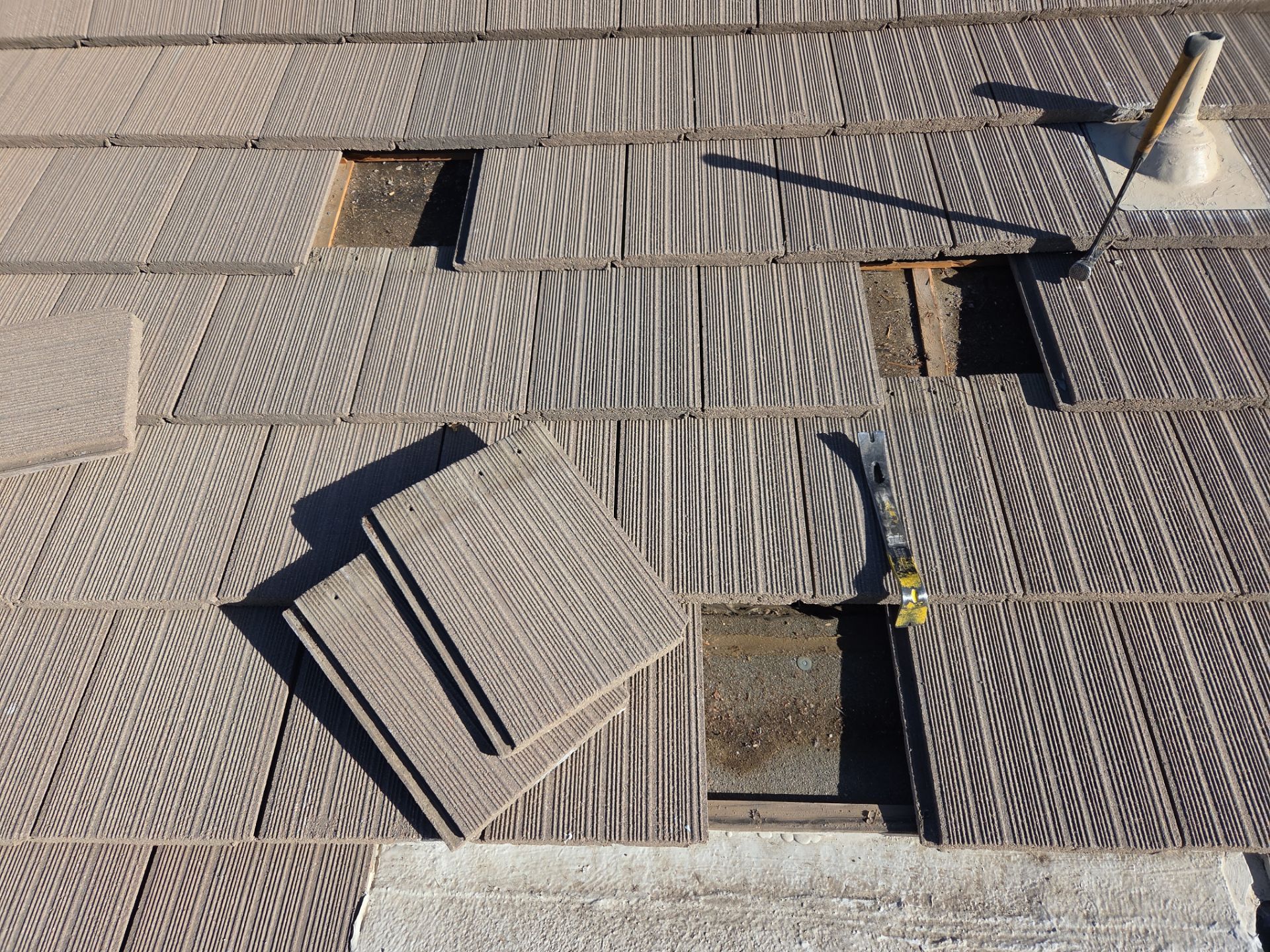 Tile replacement by RTP Roofing Company