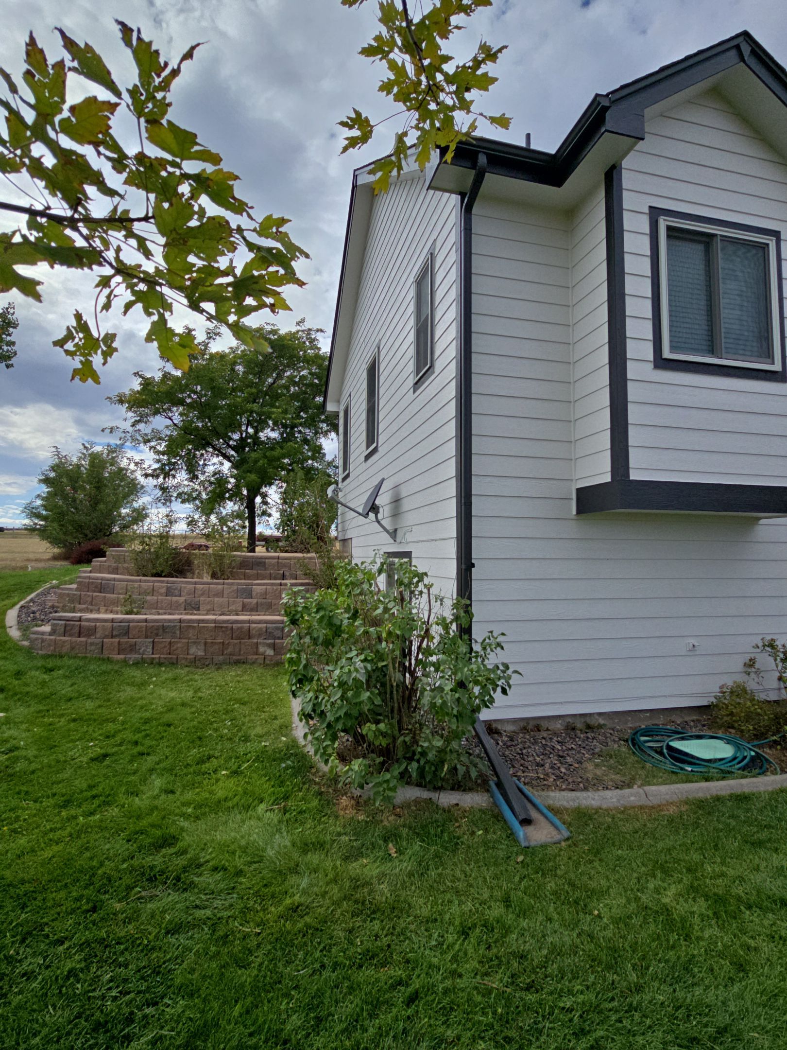 From Faded to Timeless: White & Black Exterior Renewal by J&M Painting LLC