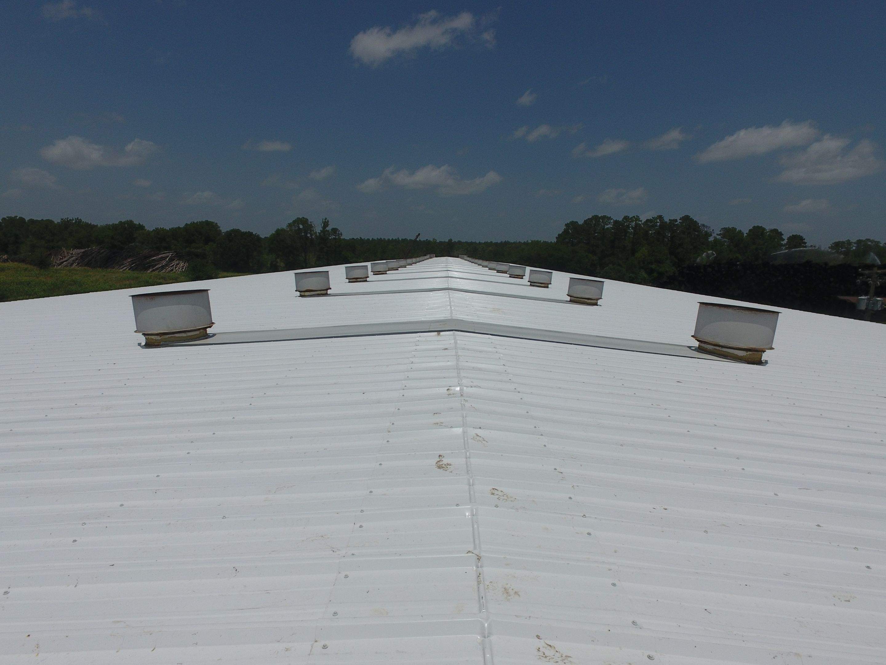 Commercial Roofing Installation using Aluminum Roofing panels by Hostetler Roofing
