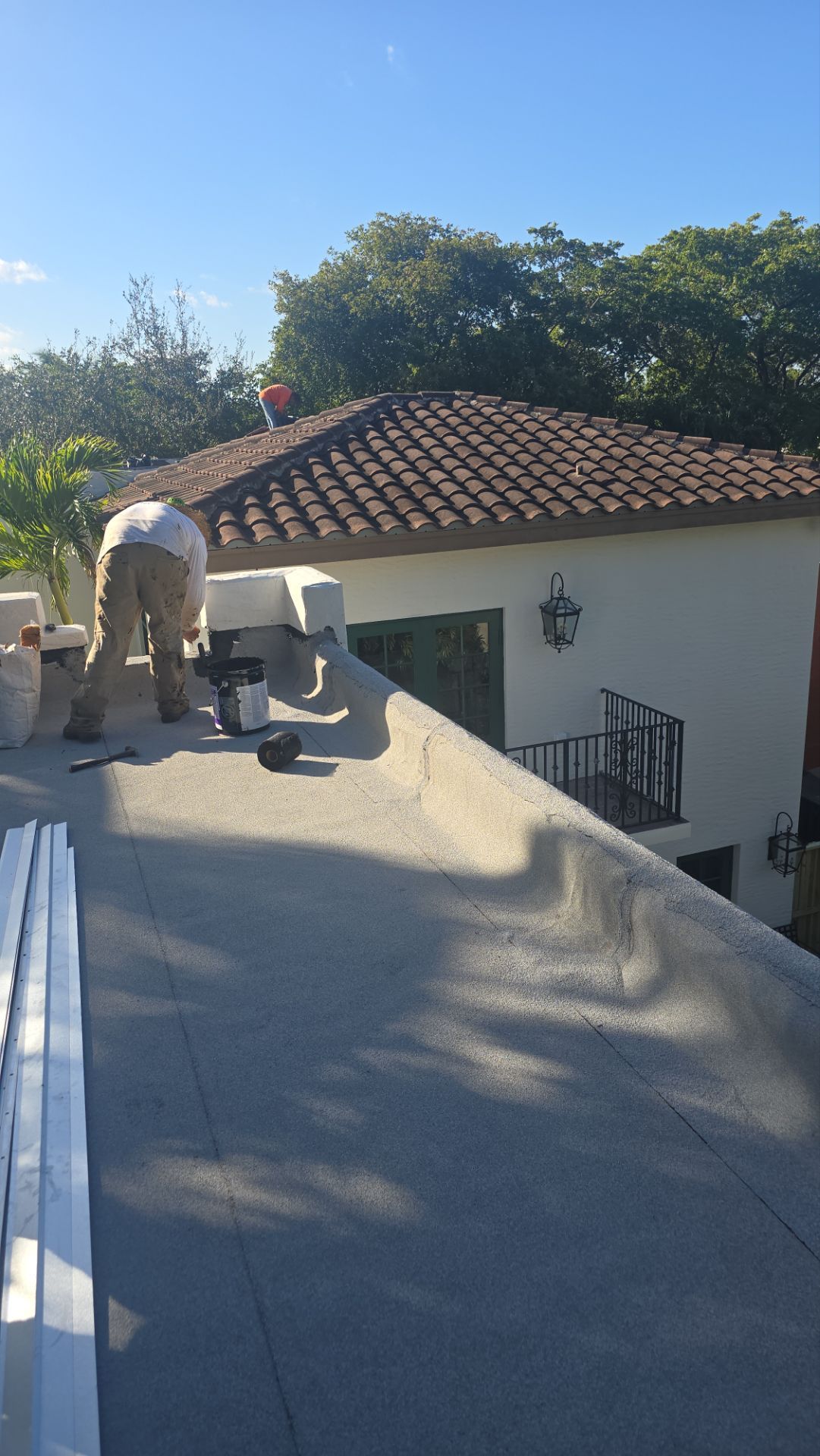 West Palm Beach Roof Restoration and Travertine Paver Driveway Installation by Aastro Roofing