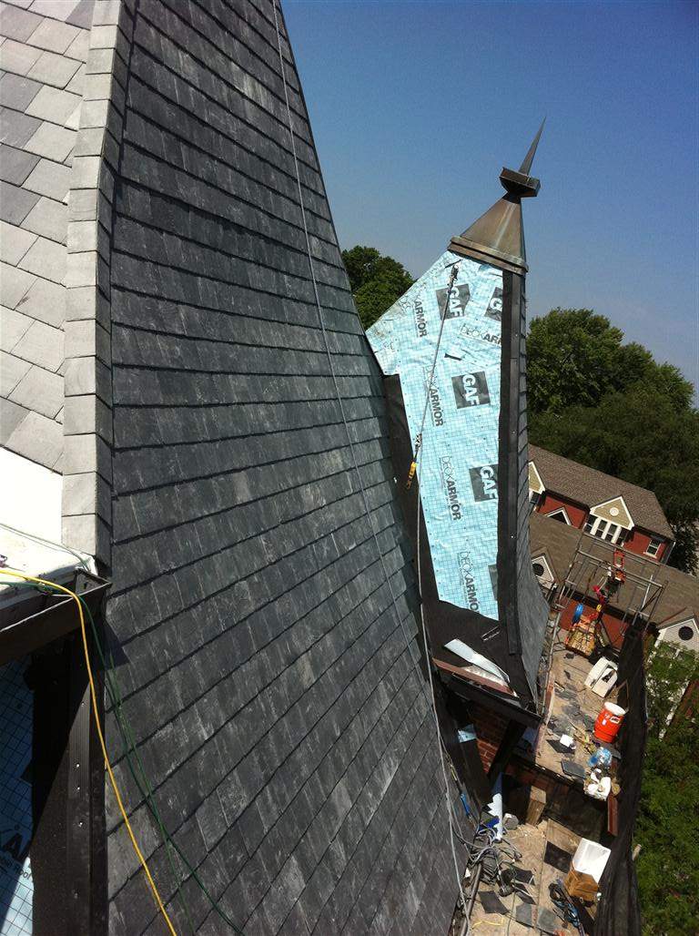 Historic Building ROOF REPLACEMNT with GAF TruSlate  on steep slop and Versico 60mil TPO on flat roof by Gorilla Exteriors Contracting, LLC