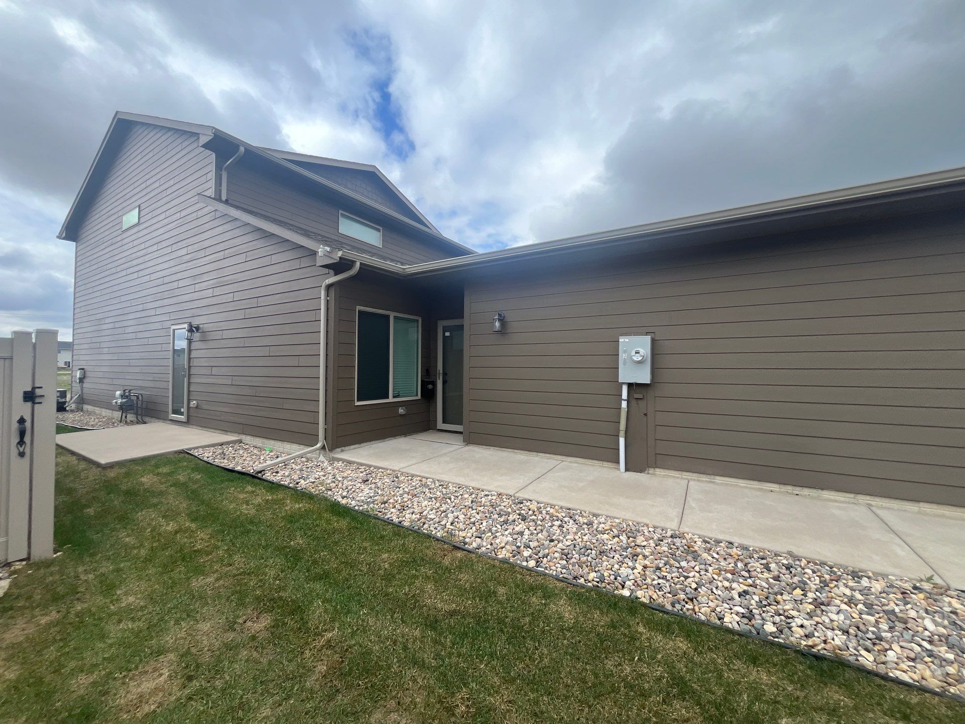 Exterior Painting for Multi-Unit Townhomes in Sioux Falls by Select Painting, Coatings & Garage Cabinets