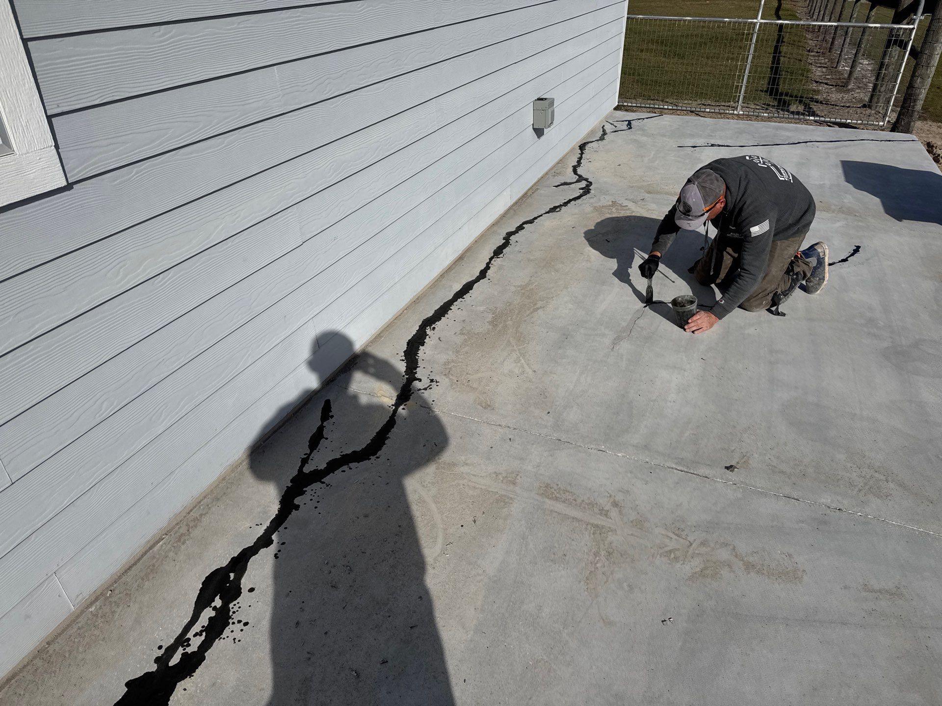 Patio in Trenton, FL in Denim by Cross Creek Concrete Coatings