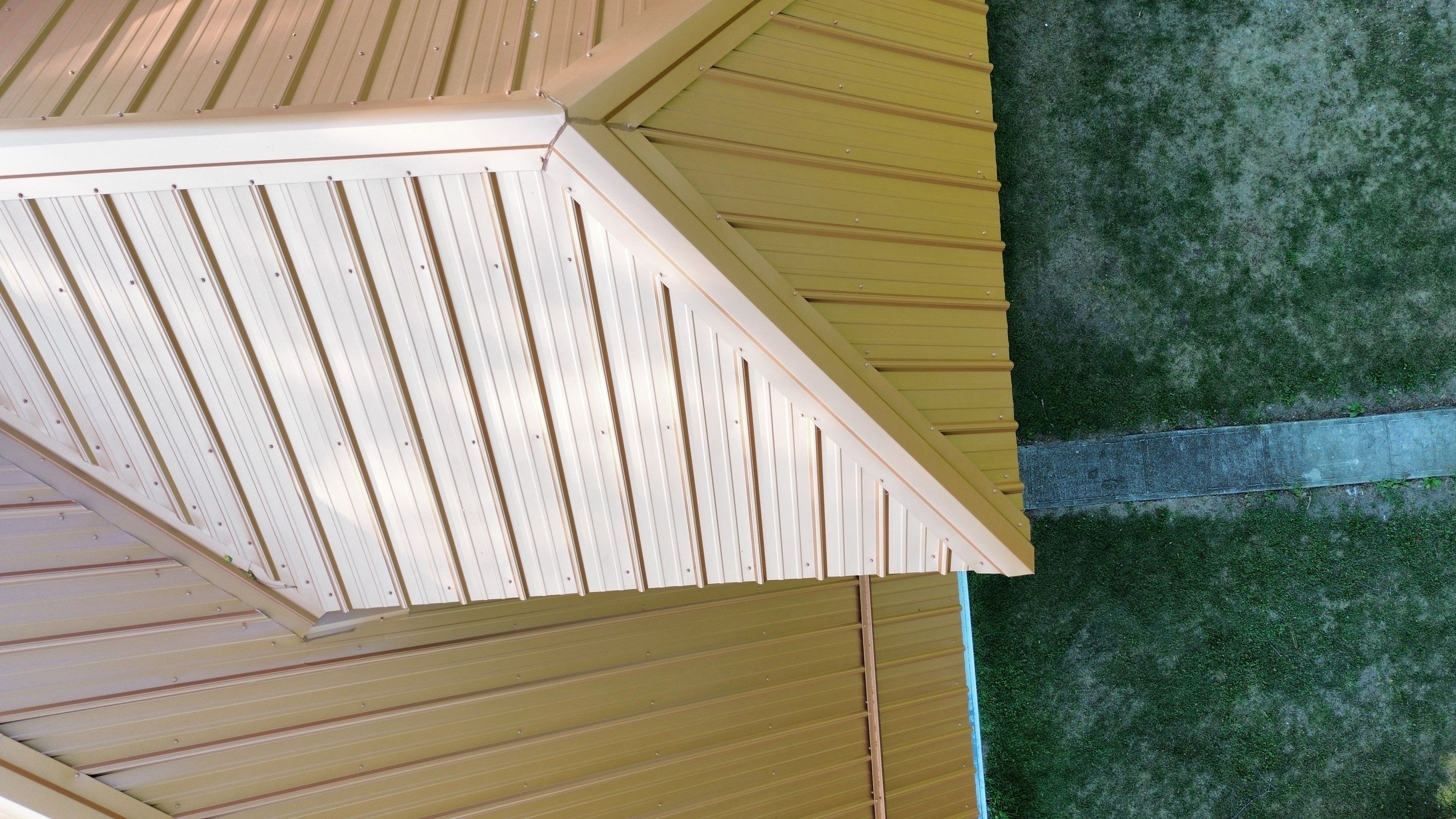 Residential Roofing Installation using Performance Panel Metal - Copper Metallic by RoofX 